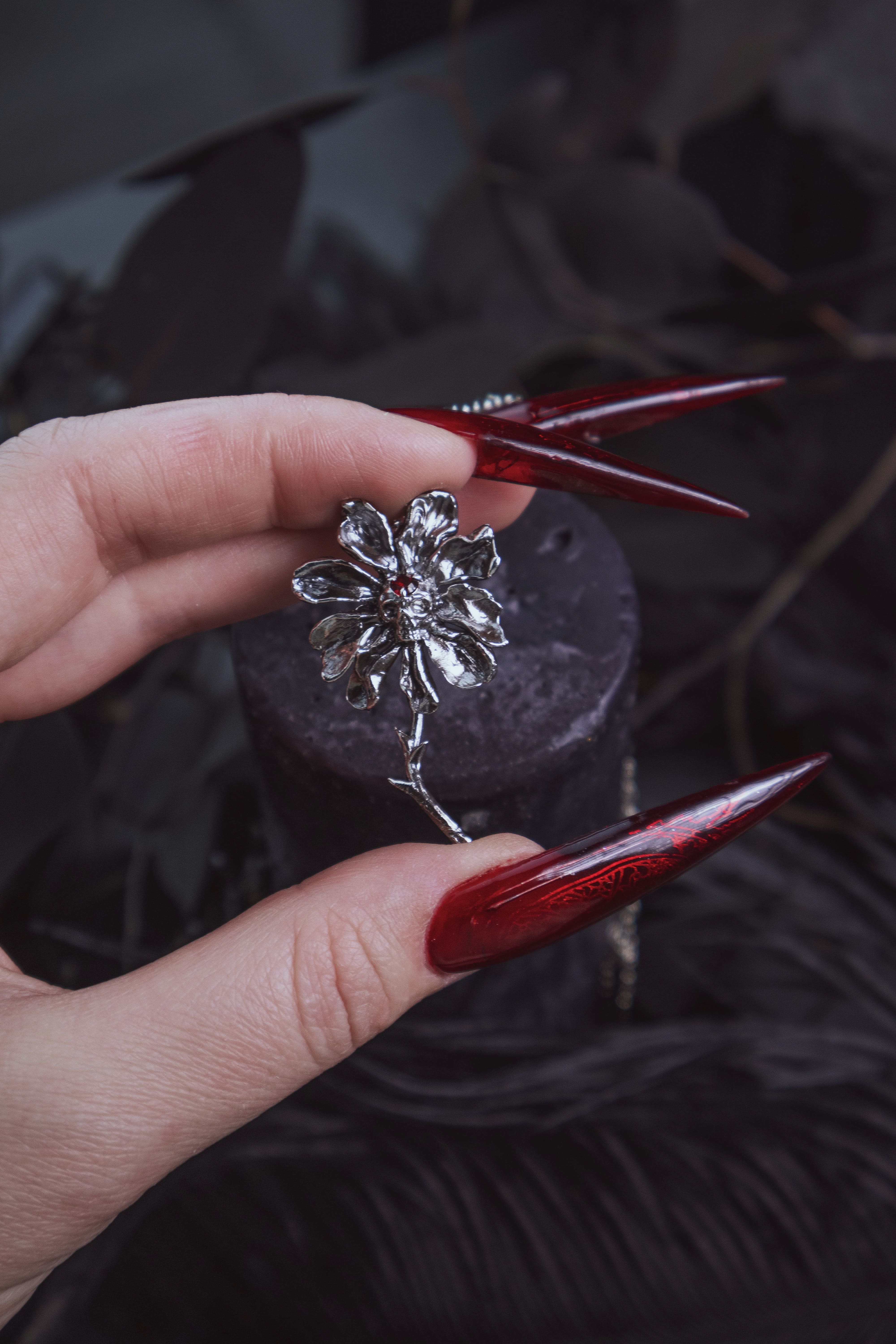 Skull Flower with Garnet