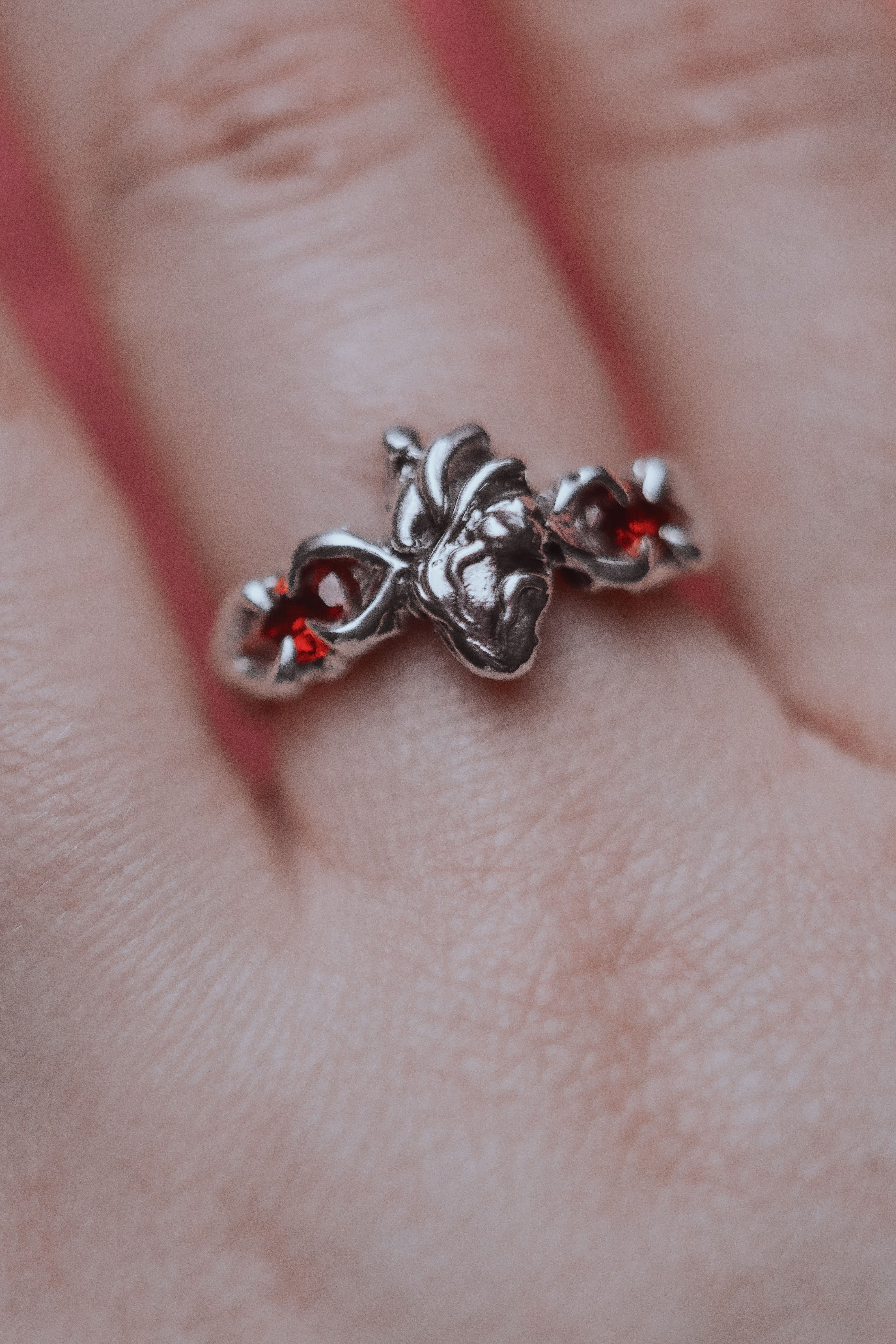Ring with an anatomical heart and stones