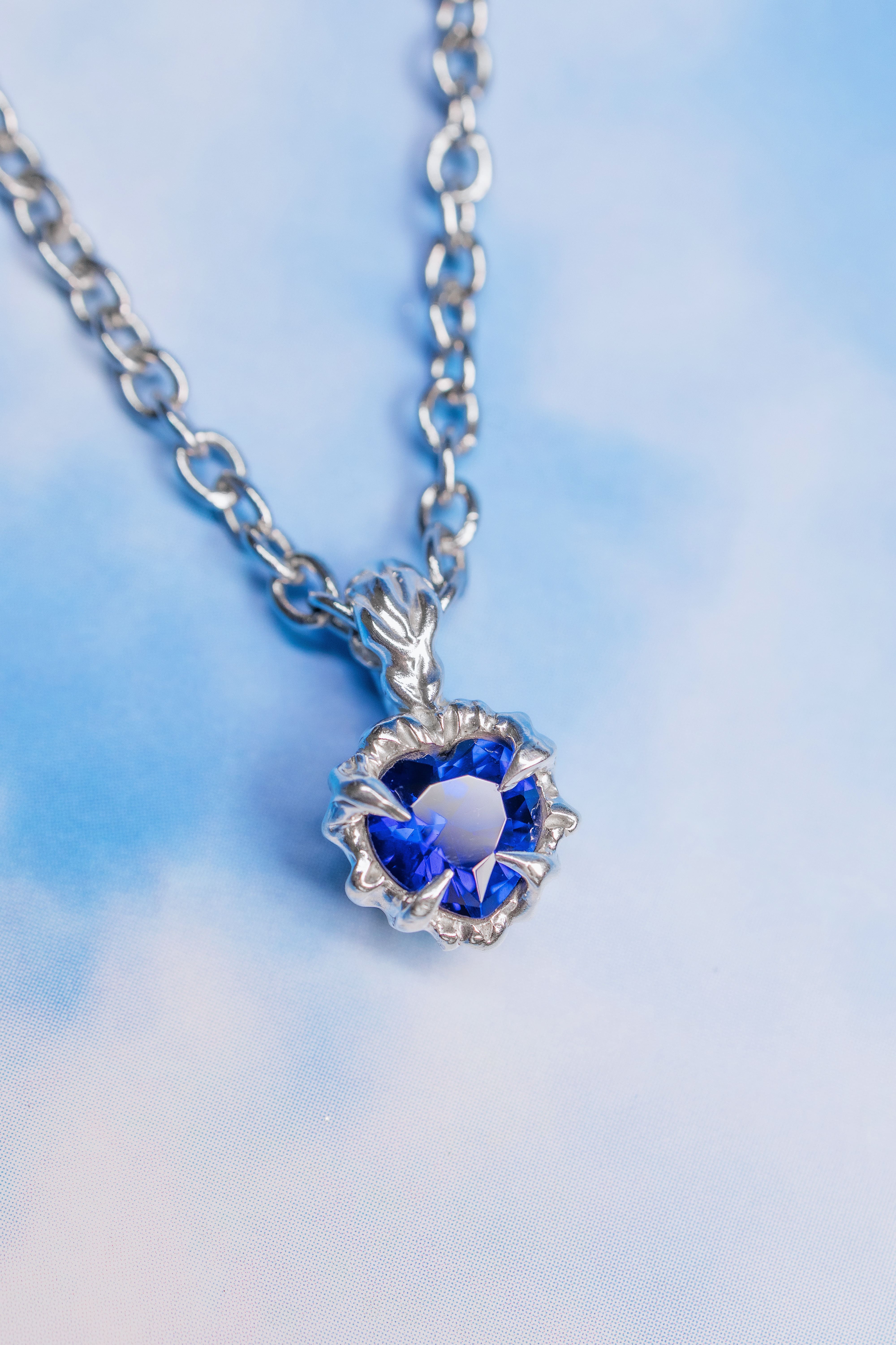 Tiny blue heart pendant