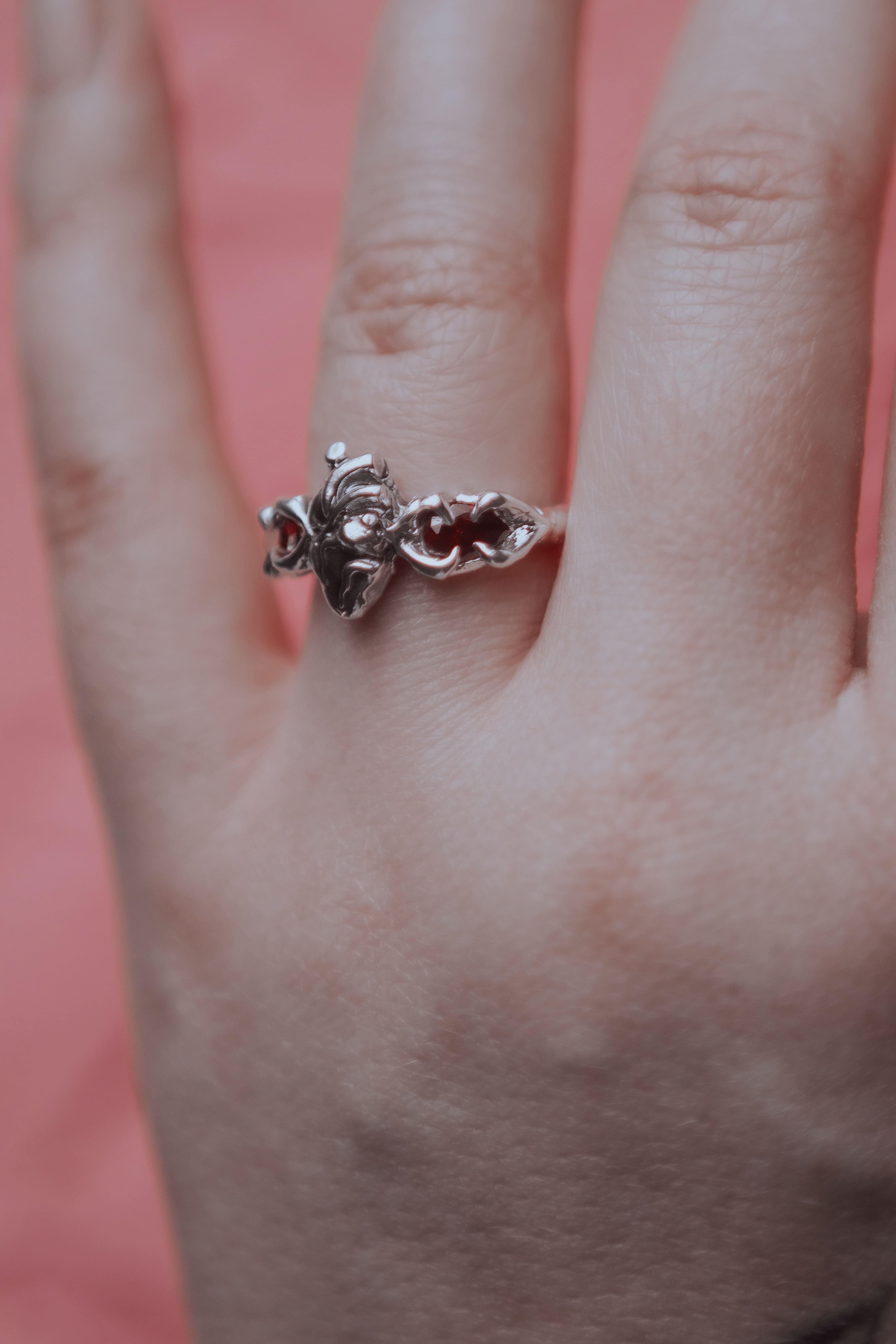 Ring with an anatomical heart and stones