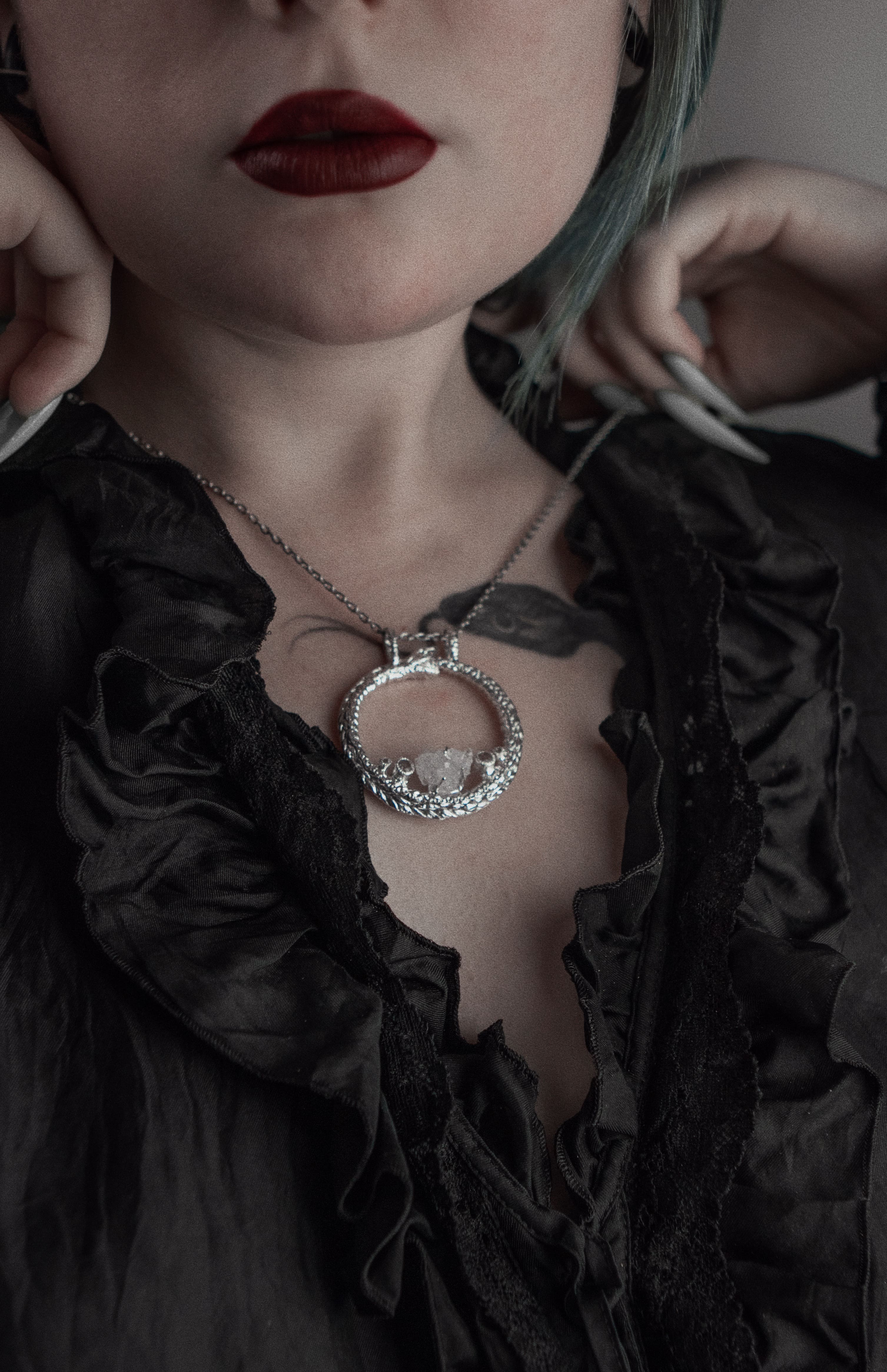 Ouroboros custom pendant with crystal and stones