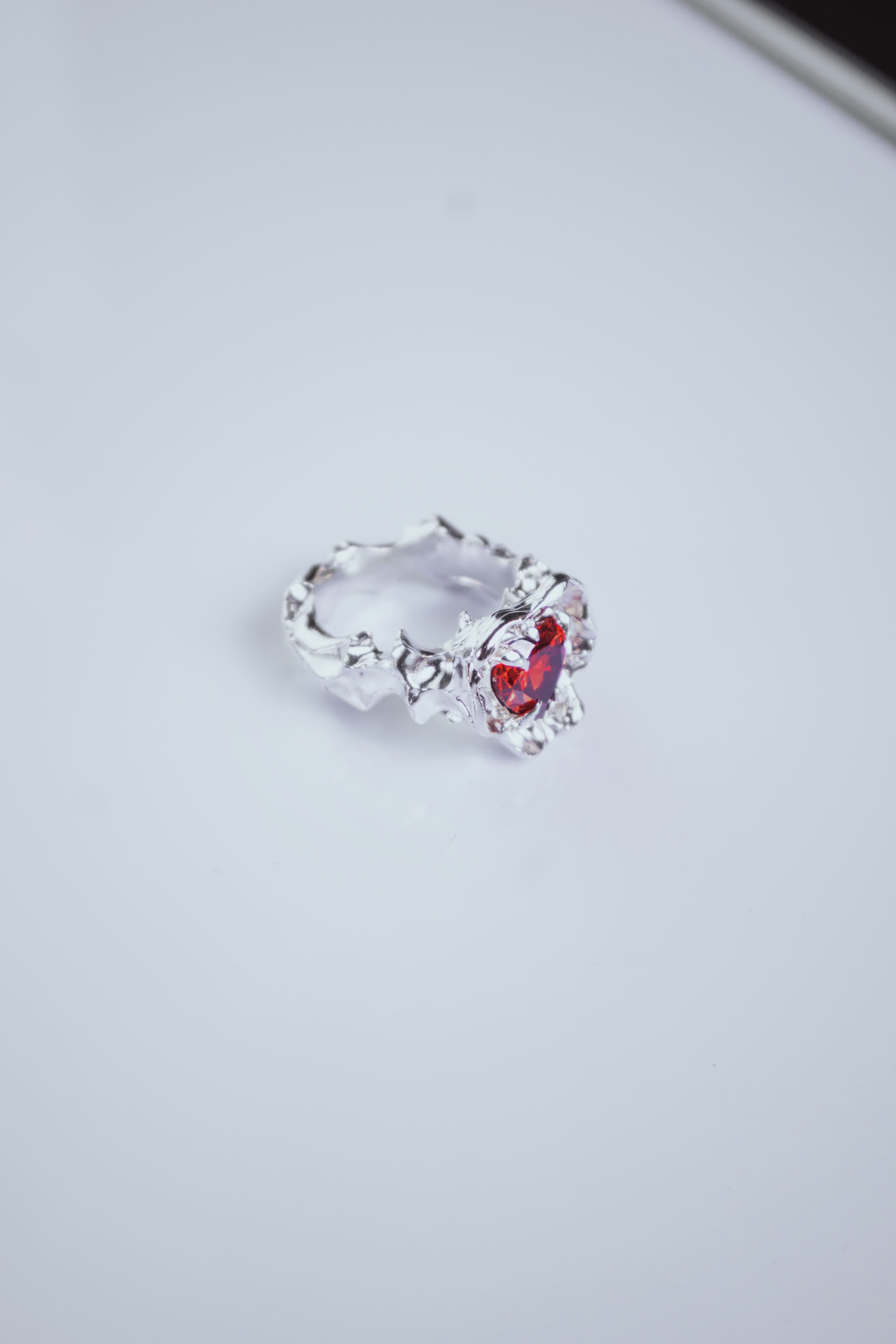 One-of-a-kind ring with a large heart-shaped stone