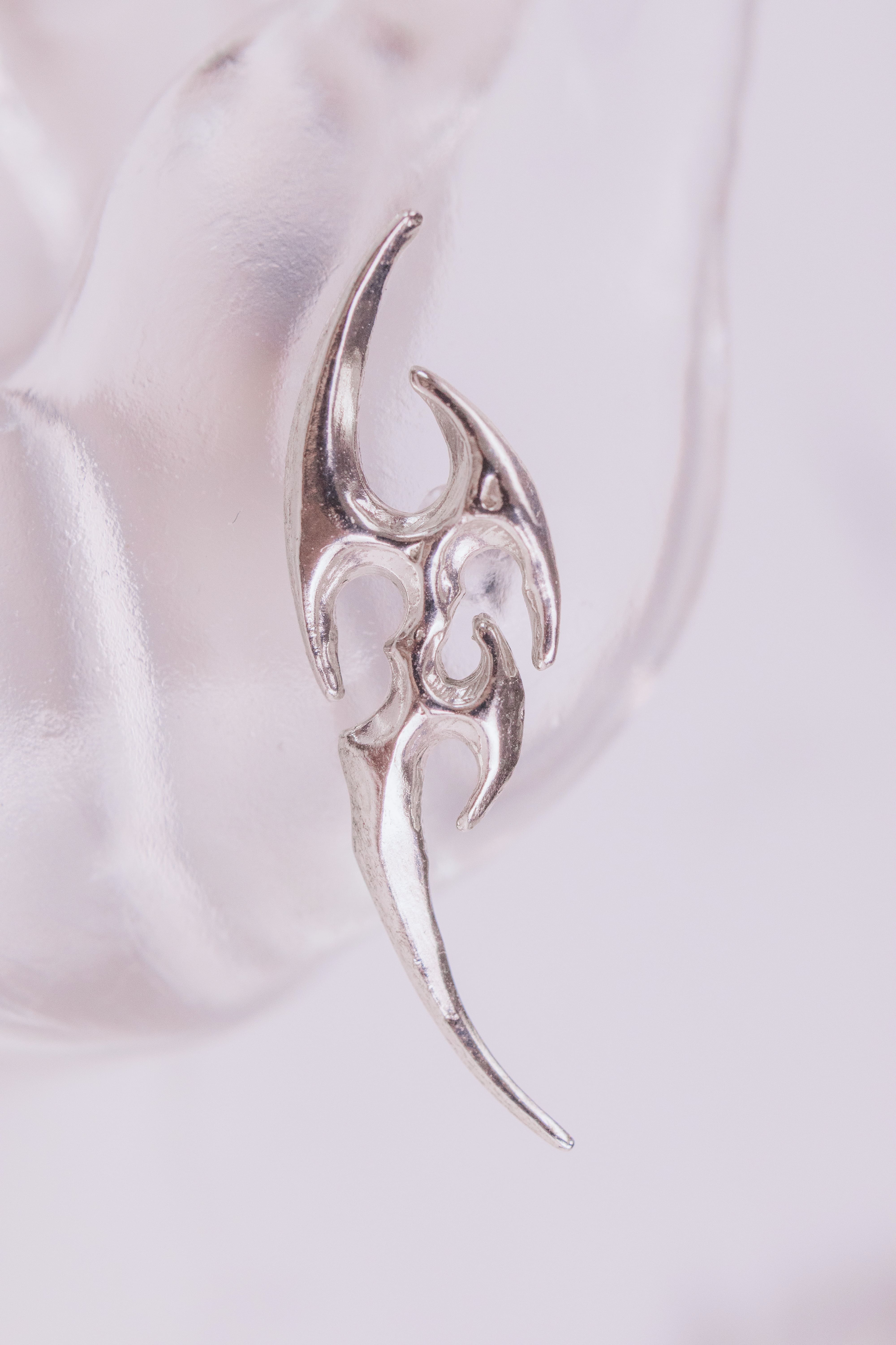 Asymmetric Tribal Studs