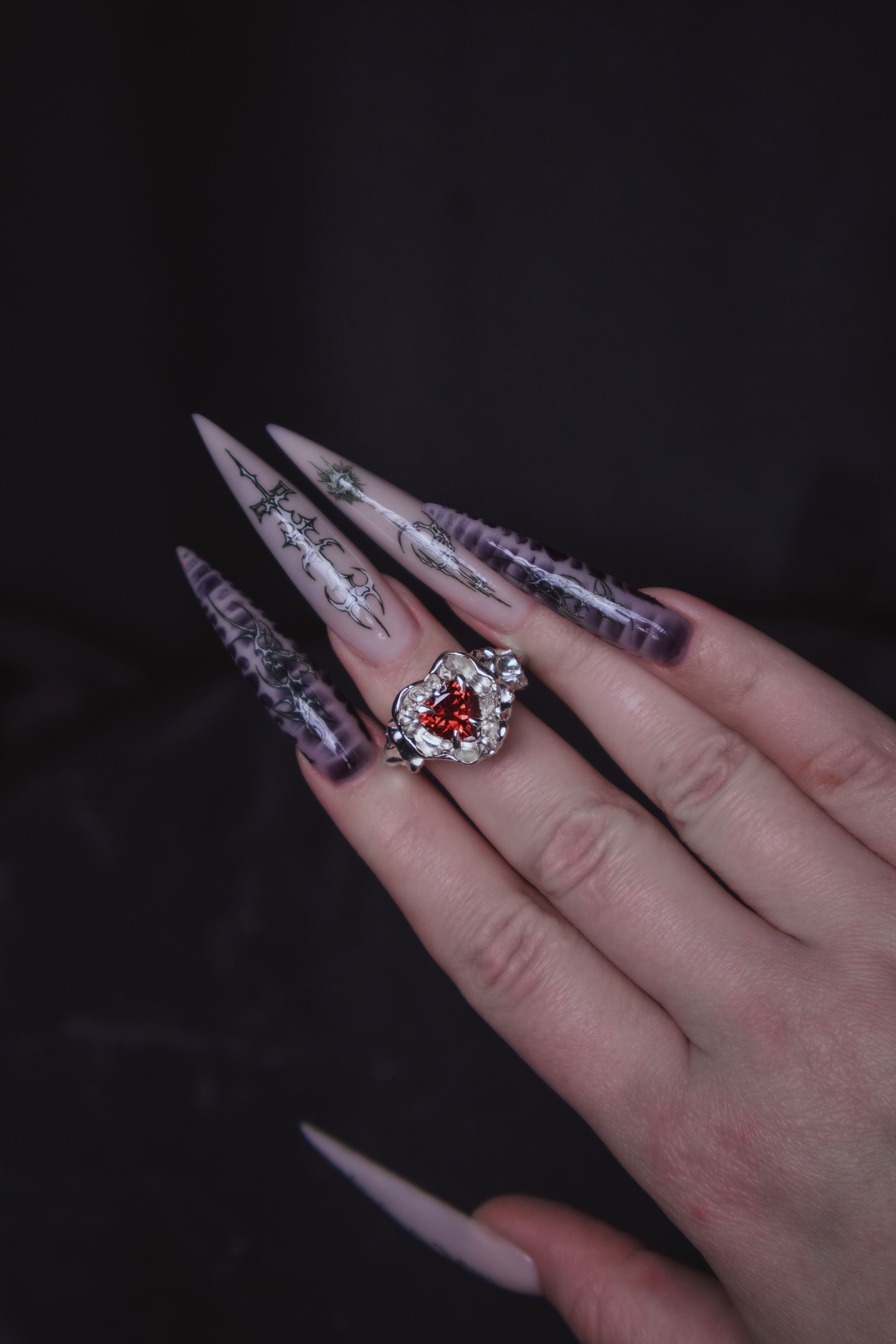 One-of-a-kind ring with a large heart-shaped stone