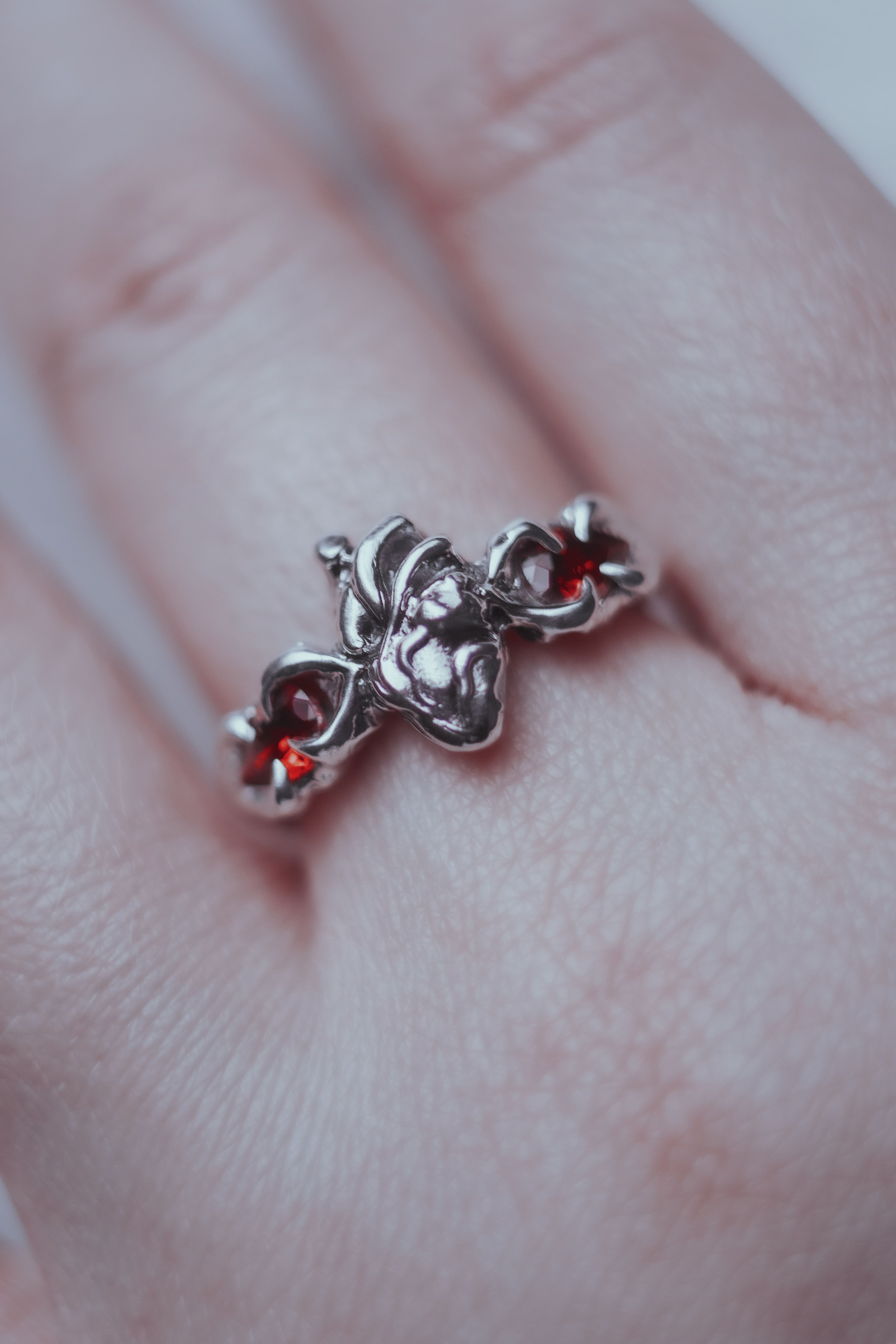 Ring with an anatomical heart and stones