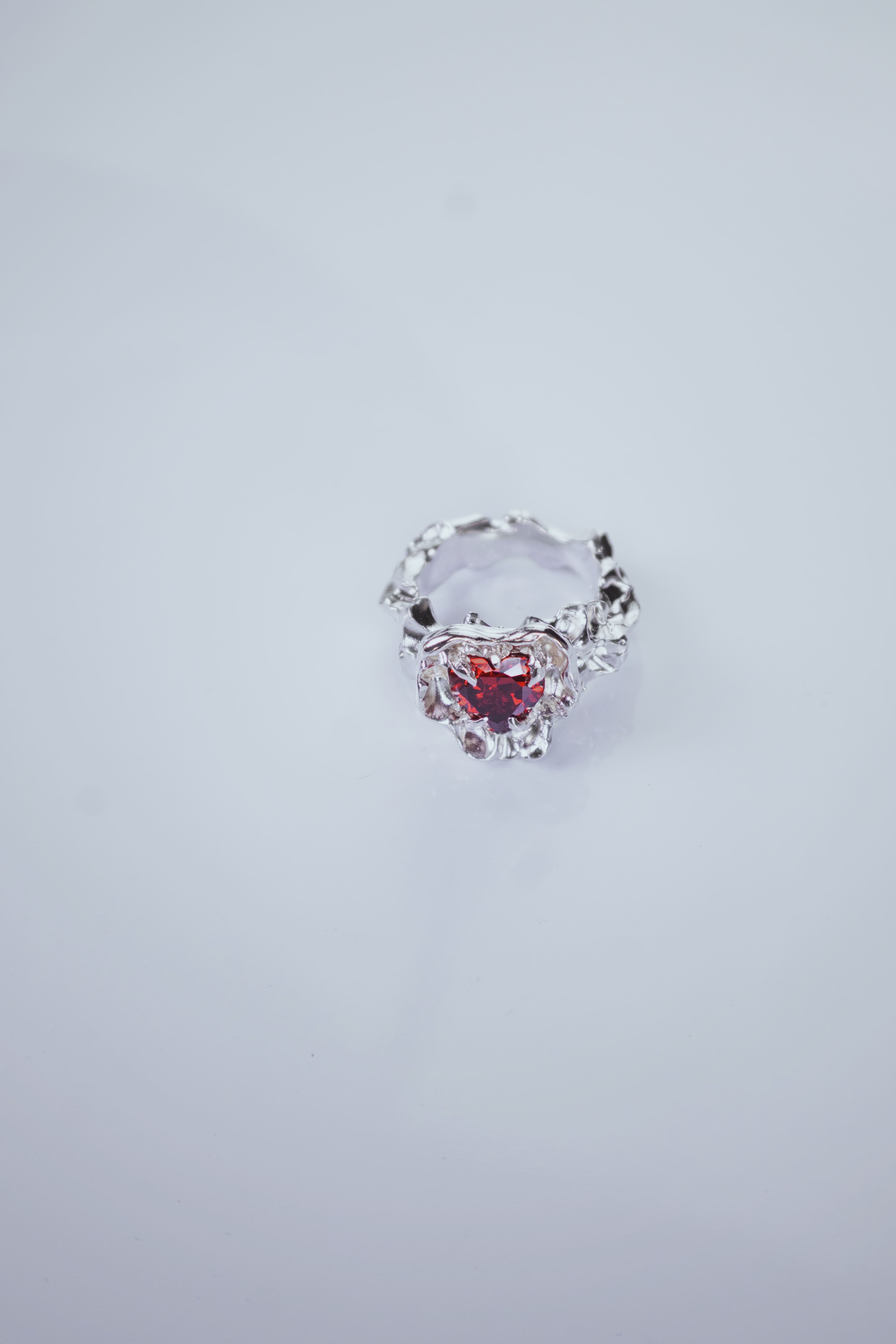 One-of-a-kind ring with a large heart-shaped stone