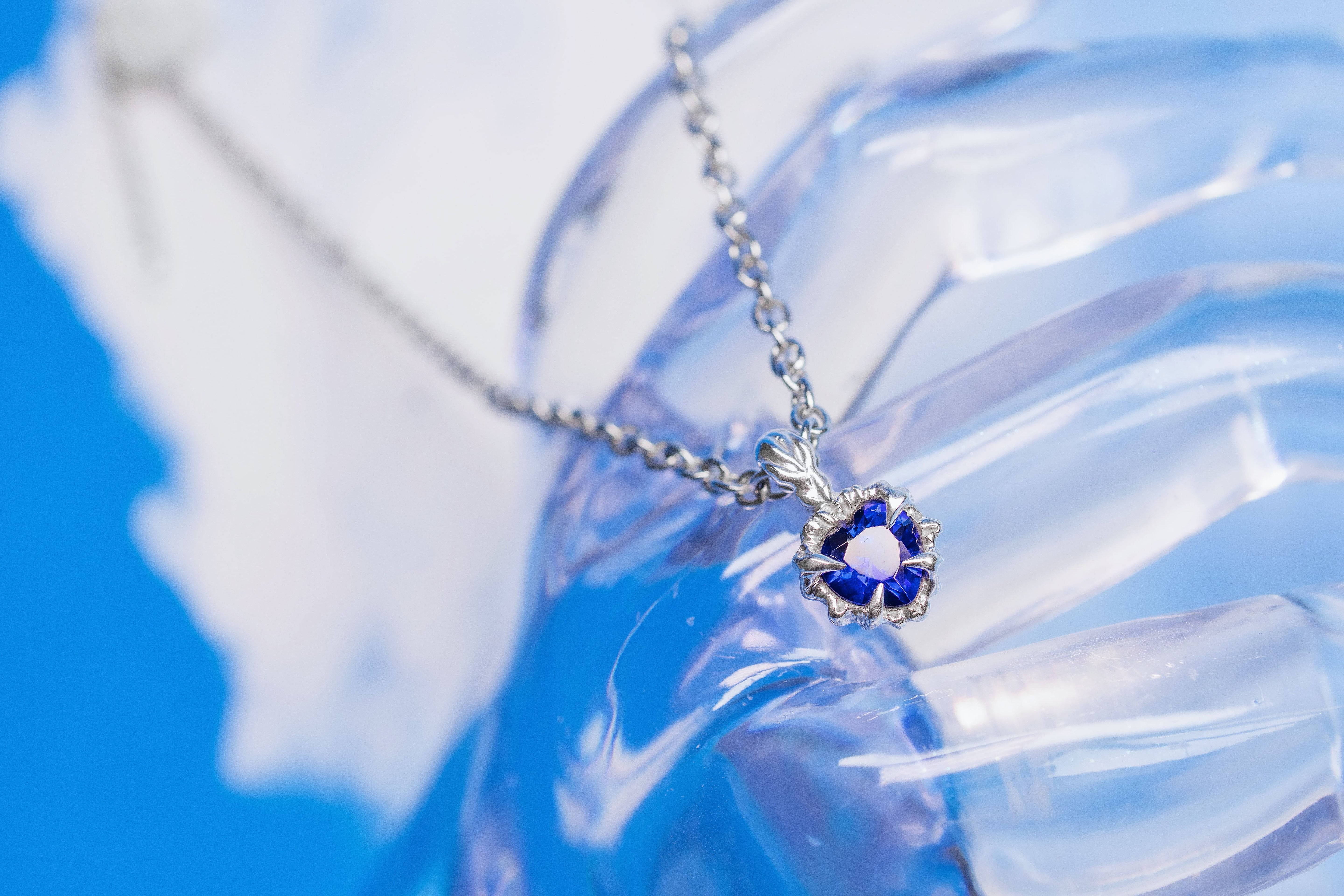 Tiny blue heart pendant