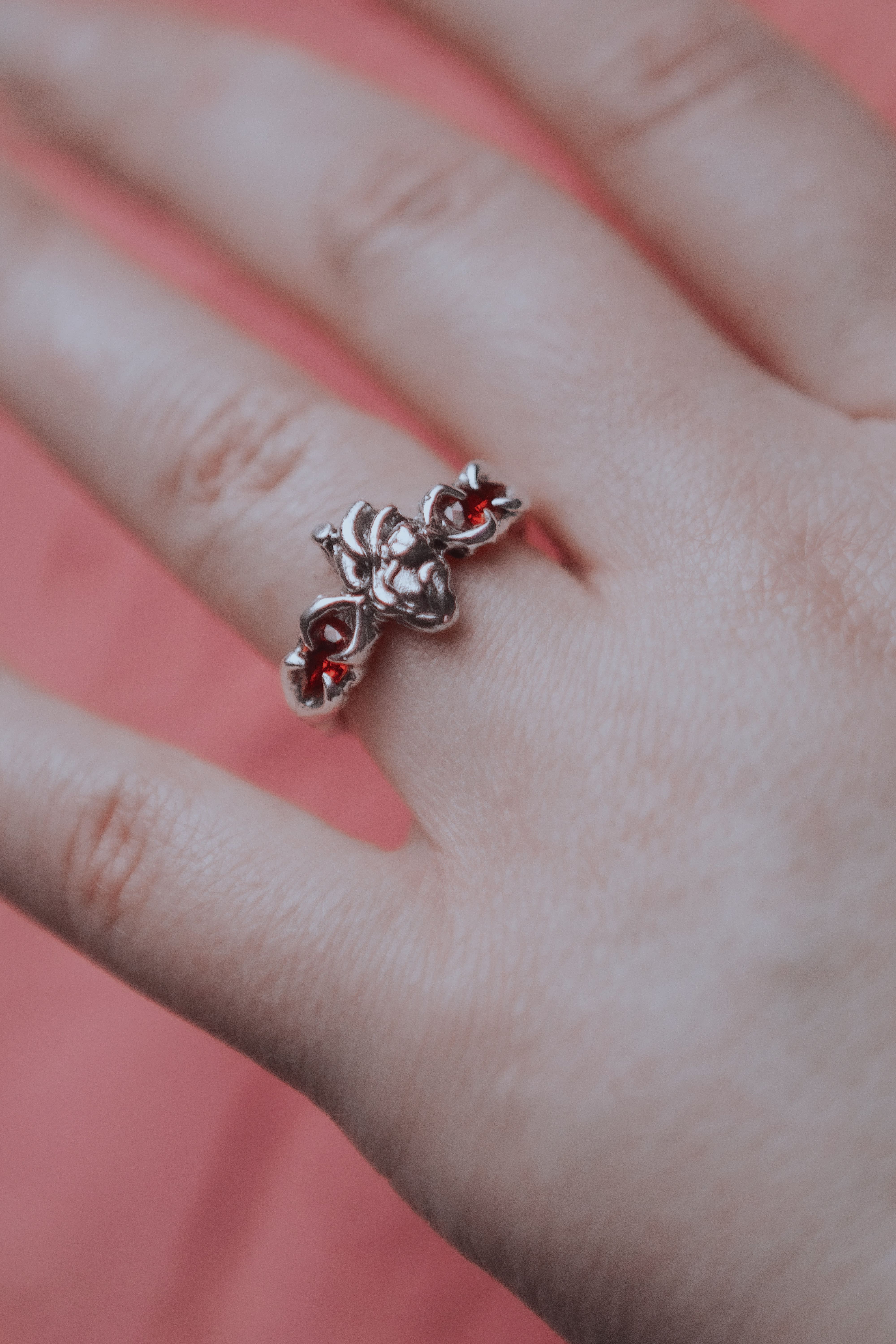 Ring with an anatomical heart and stones