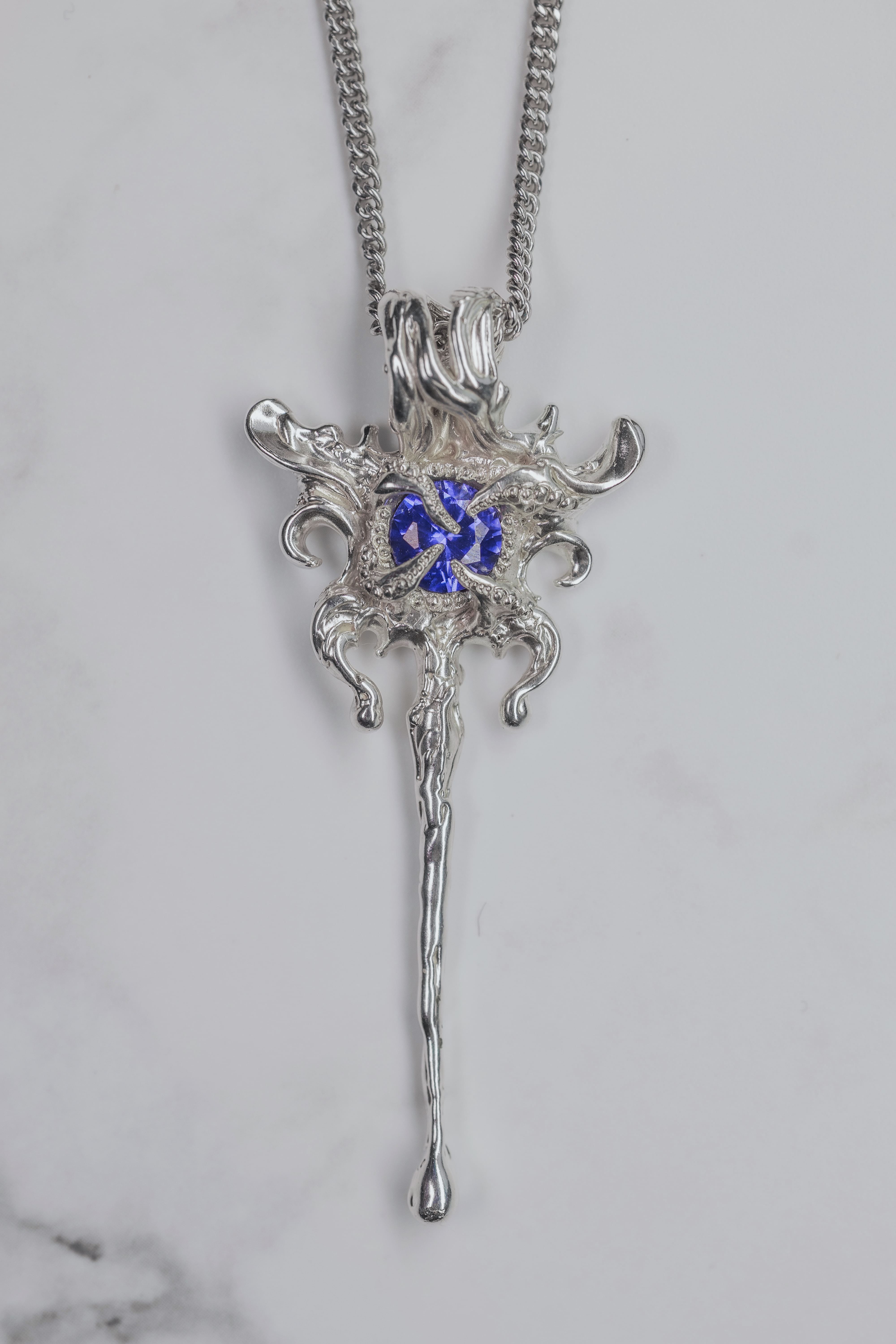 Fantasy pendant with a violet-blue stone