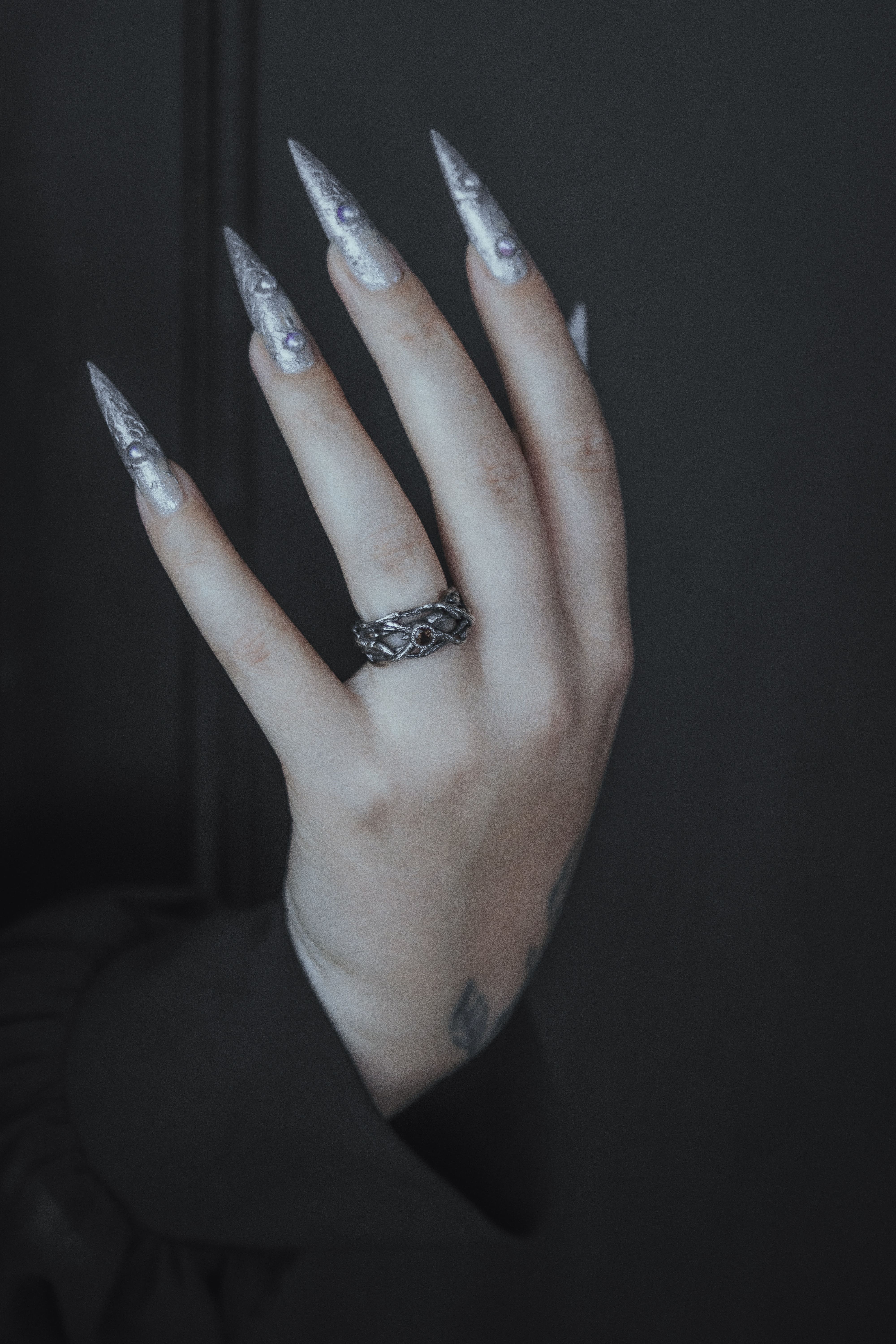 Ring with branches and stone