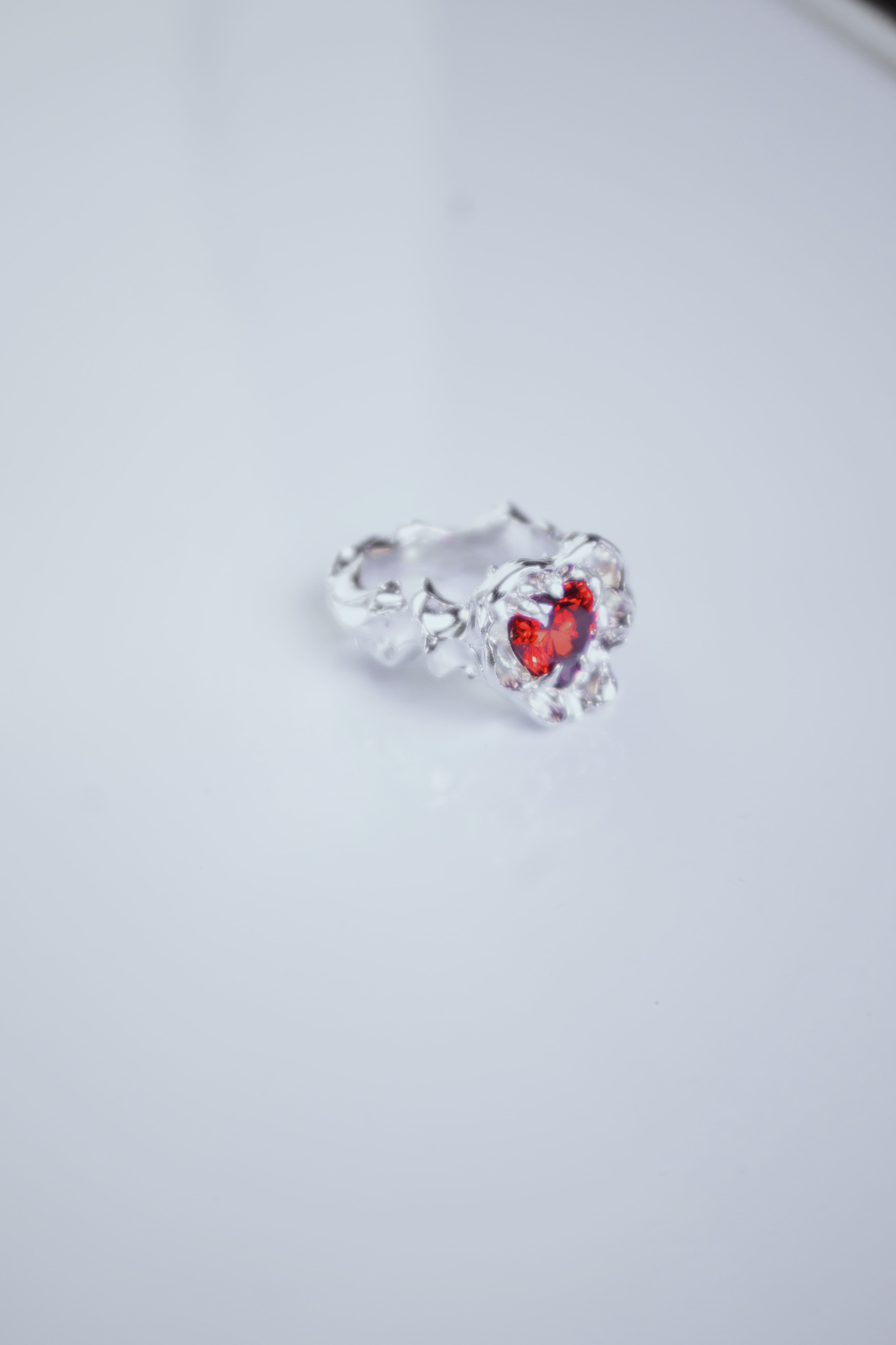 One-of-a-kind ring with a large heart-shaped stone