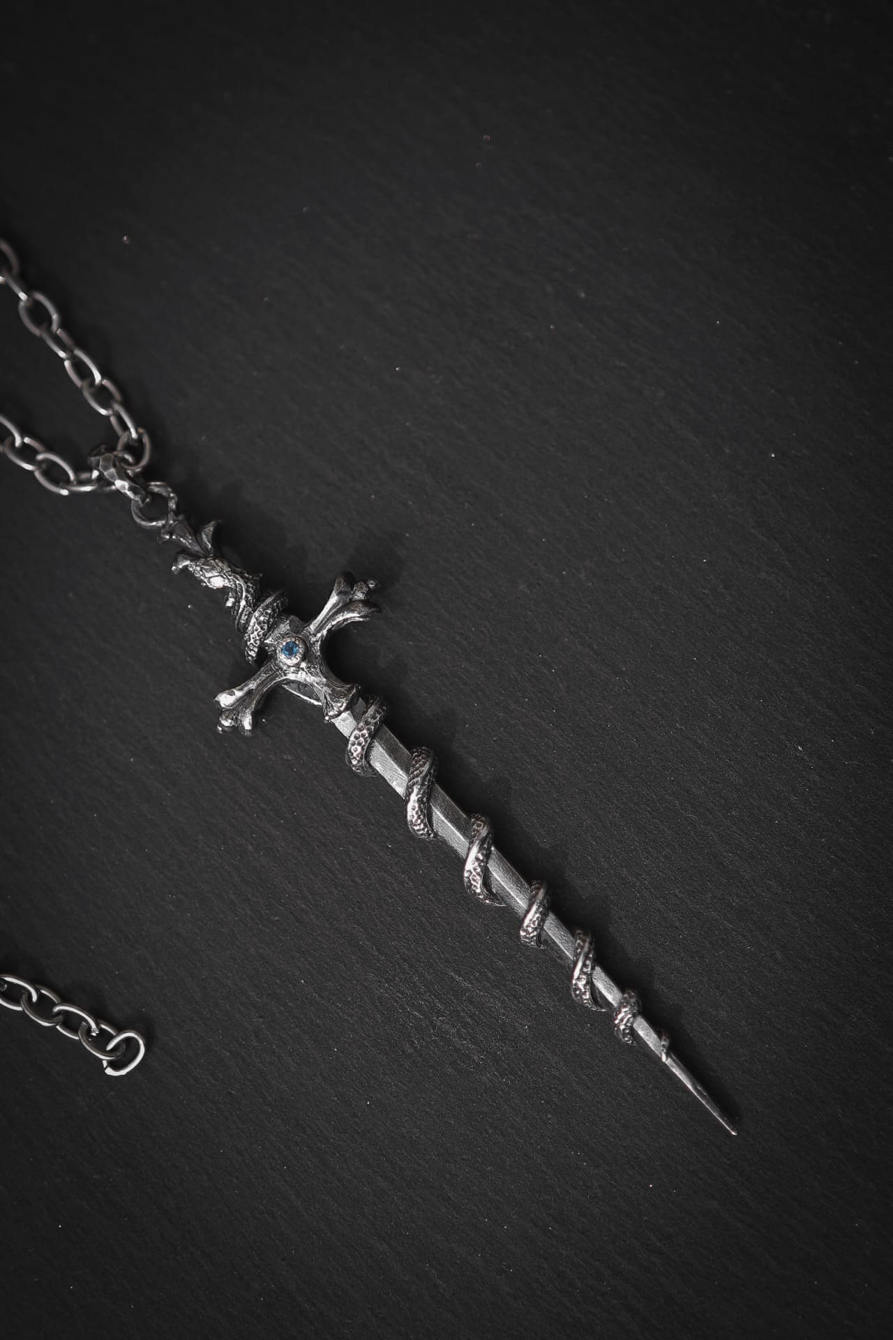 Sword-Pendant with Snake and Stone