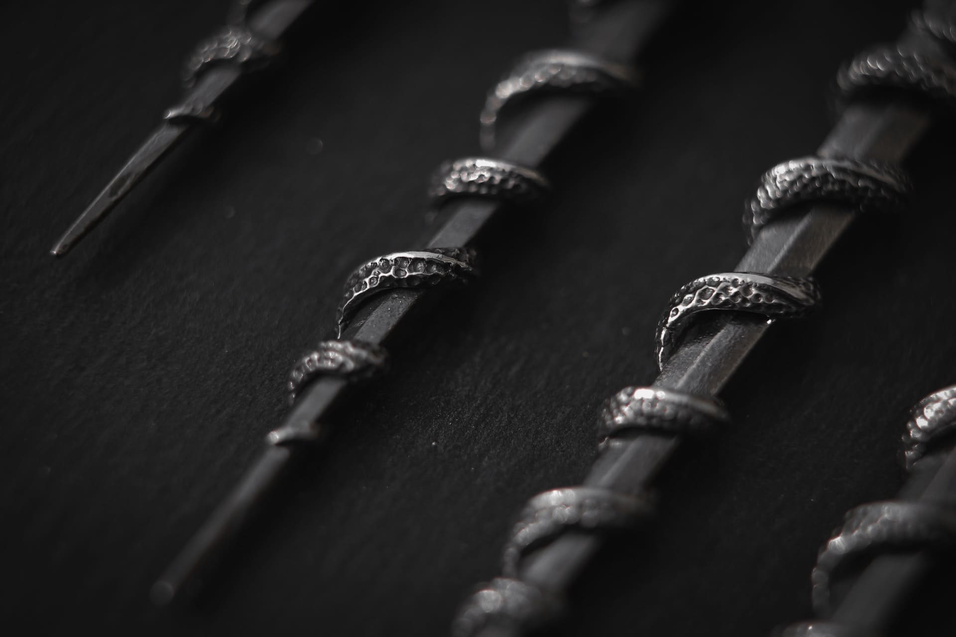 Sword-Pendant with Snake and Stone
