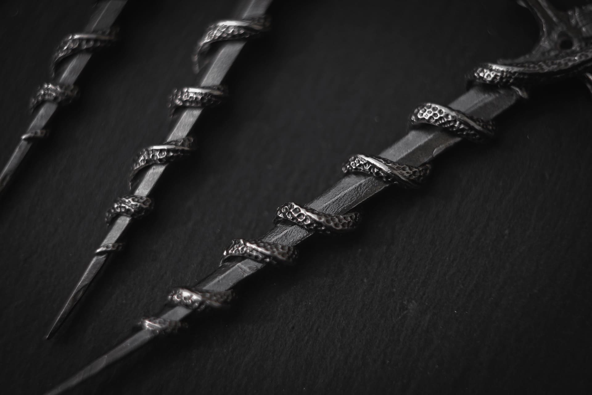 Sword-Pendant with Snake and Stone