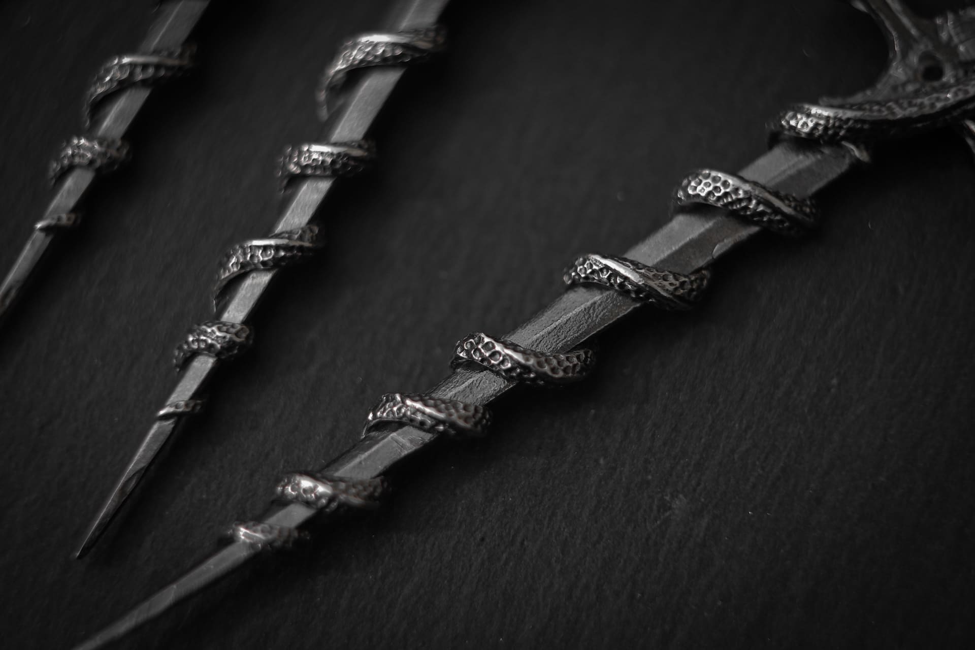 Sword-Pendant with Snake and Stone