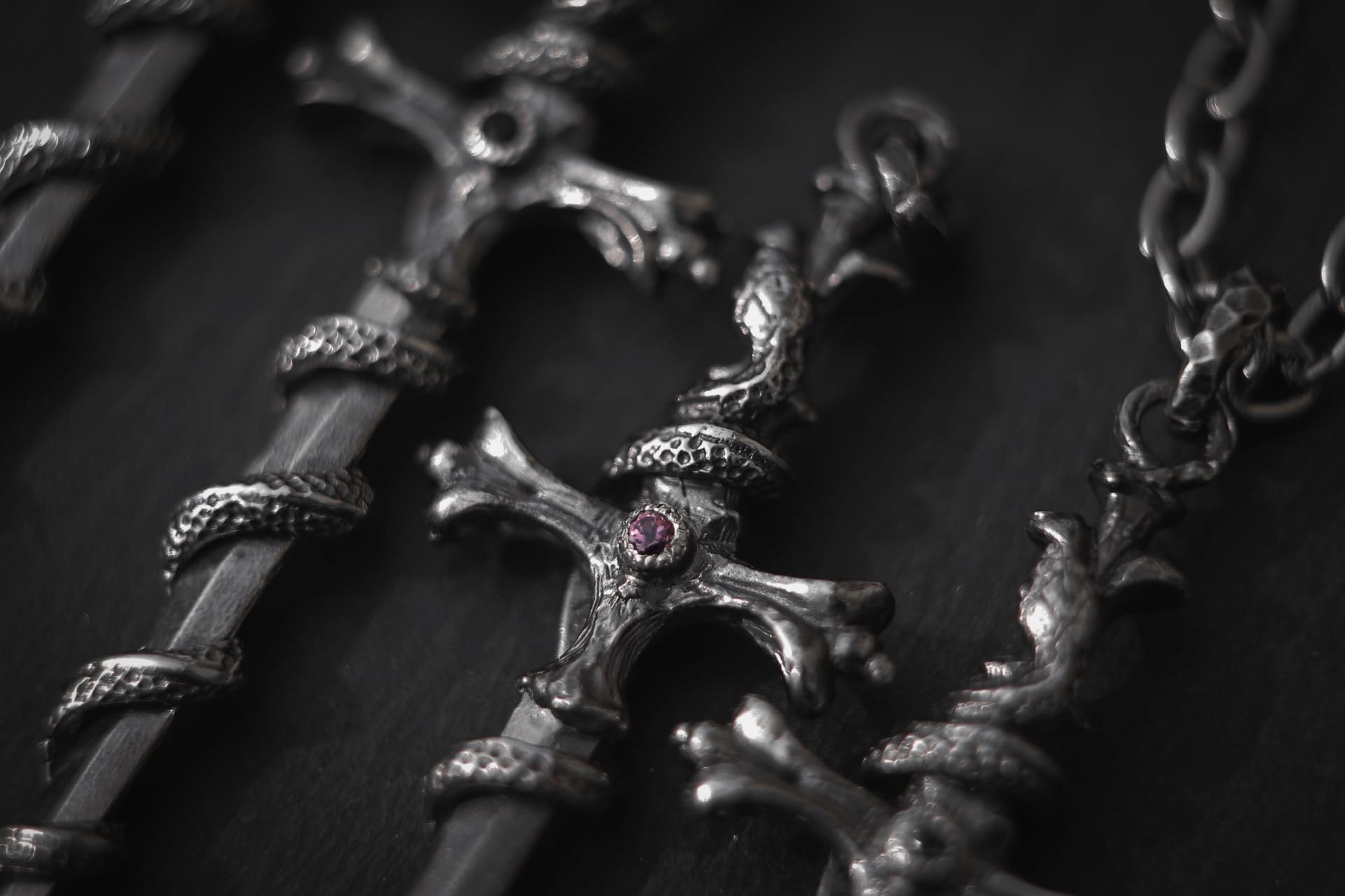 Sword-Pendant with Snake and Stone