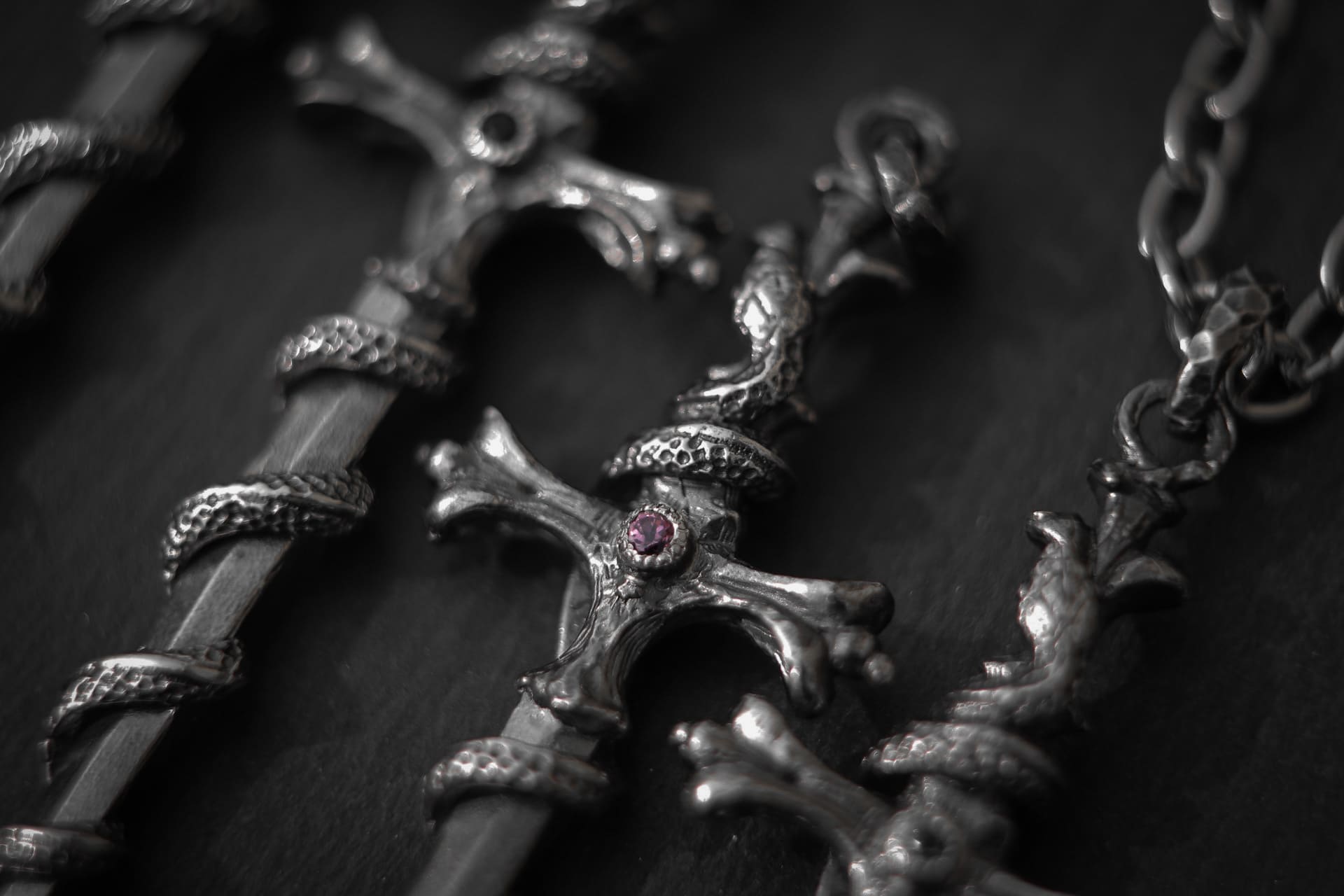 Sword-Pendant with Snake and Stone