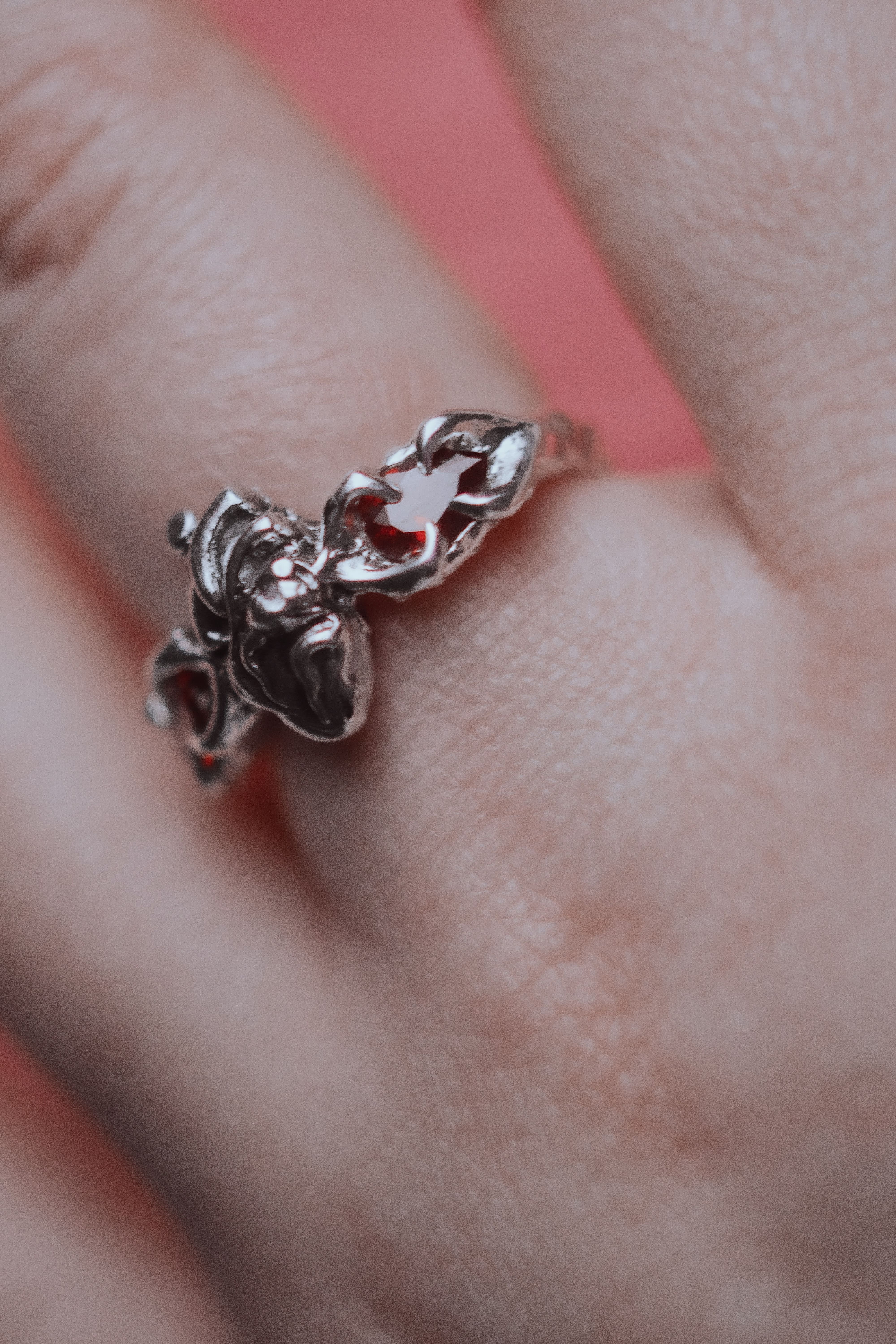Ring with an anatomical heart and stones