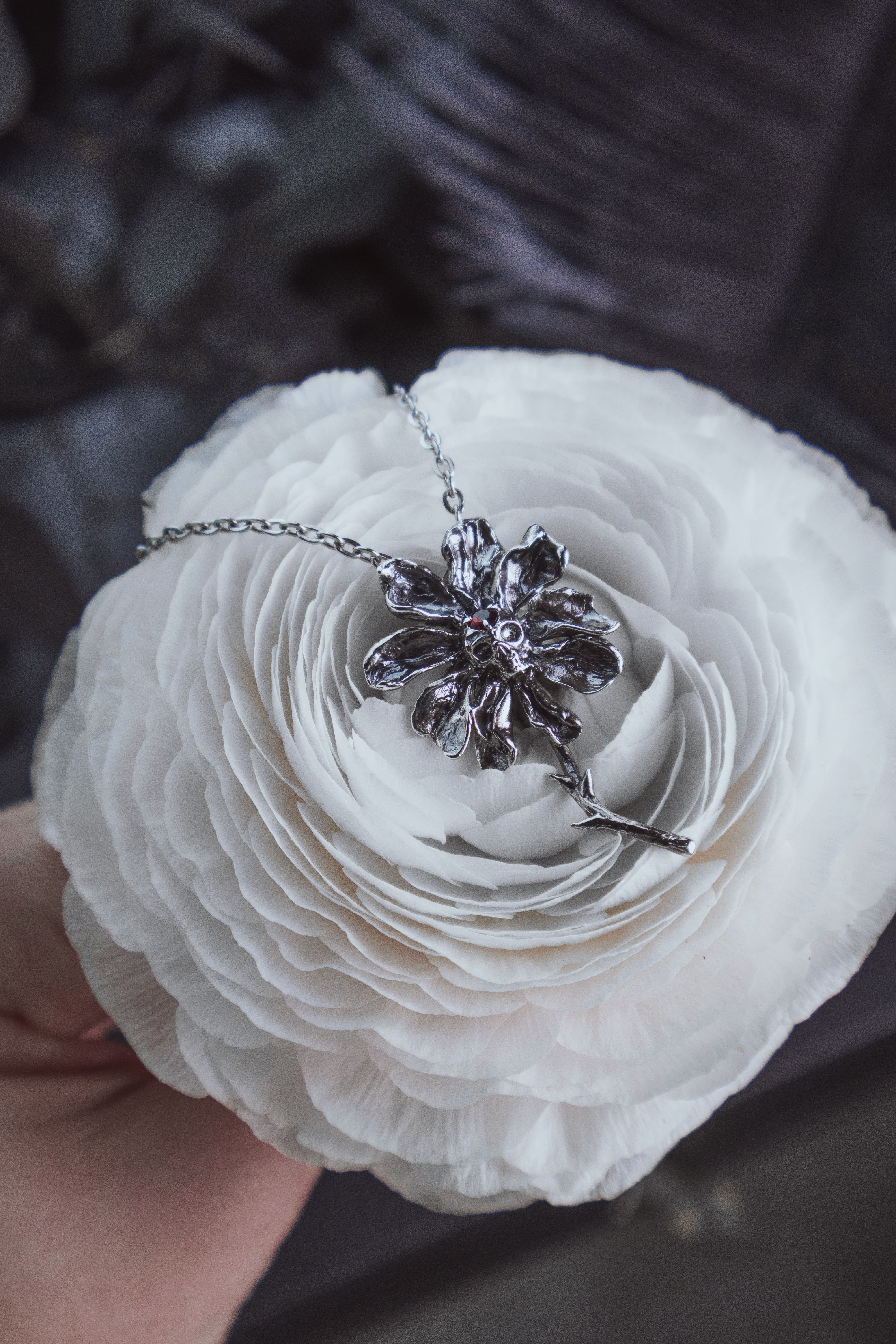 Skull Flower with Garnet