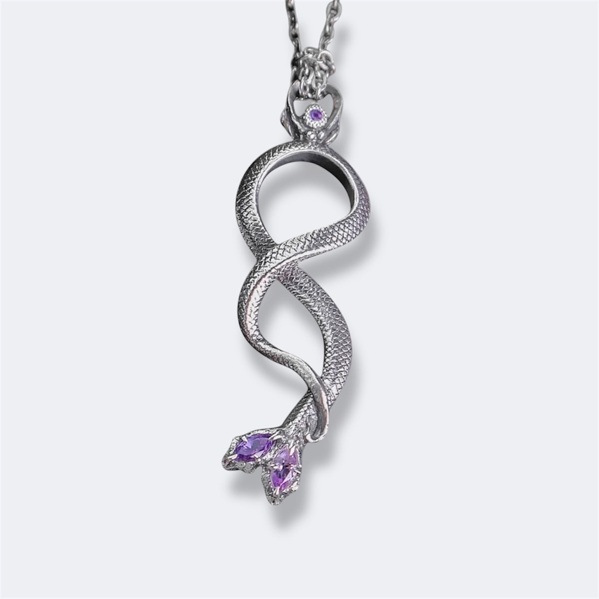 “Dualis” pendant with stones