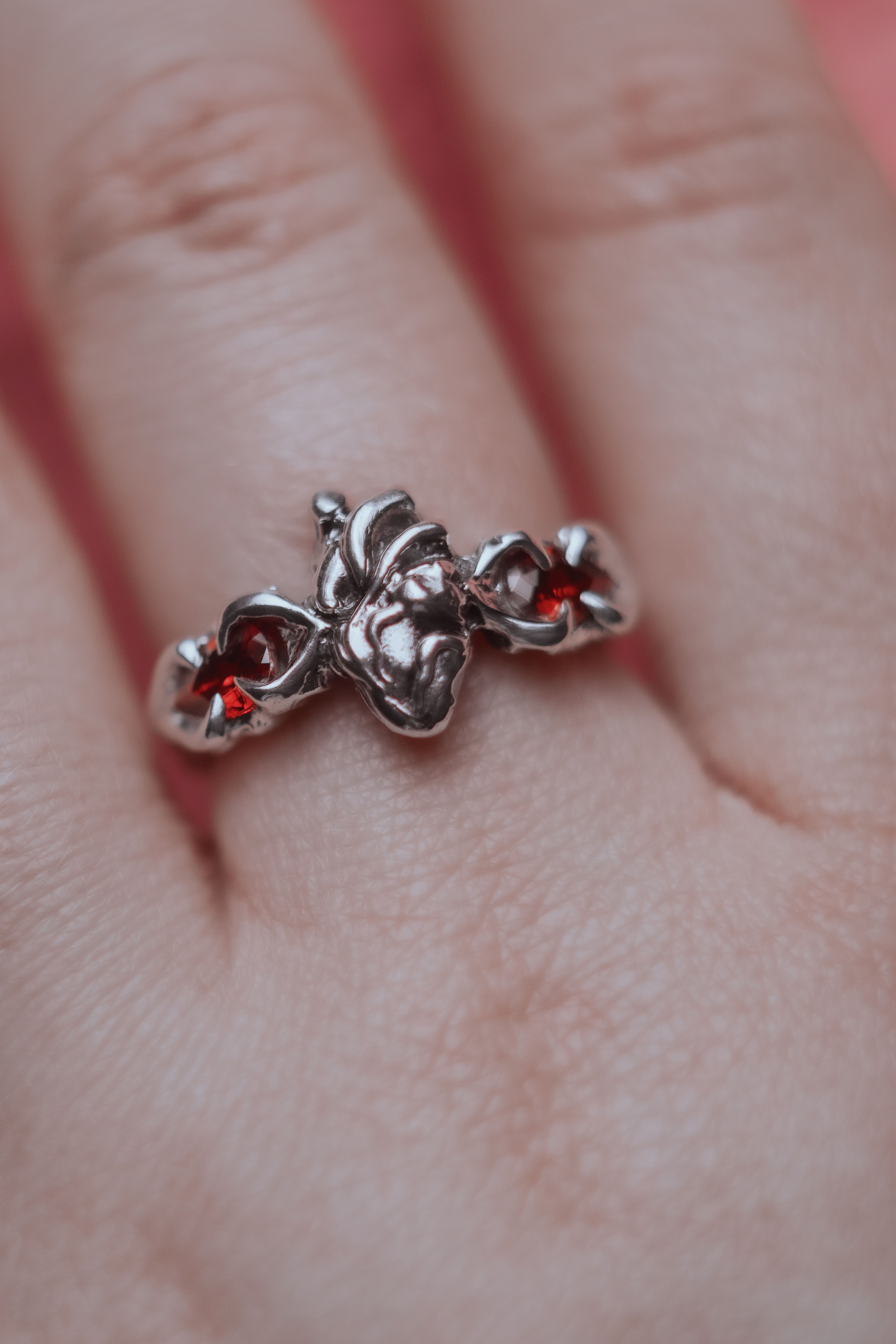 Ring with an anatomical heart and stones