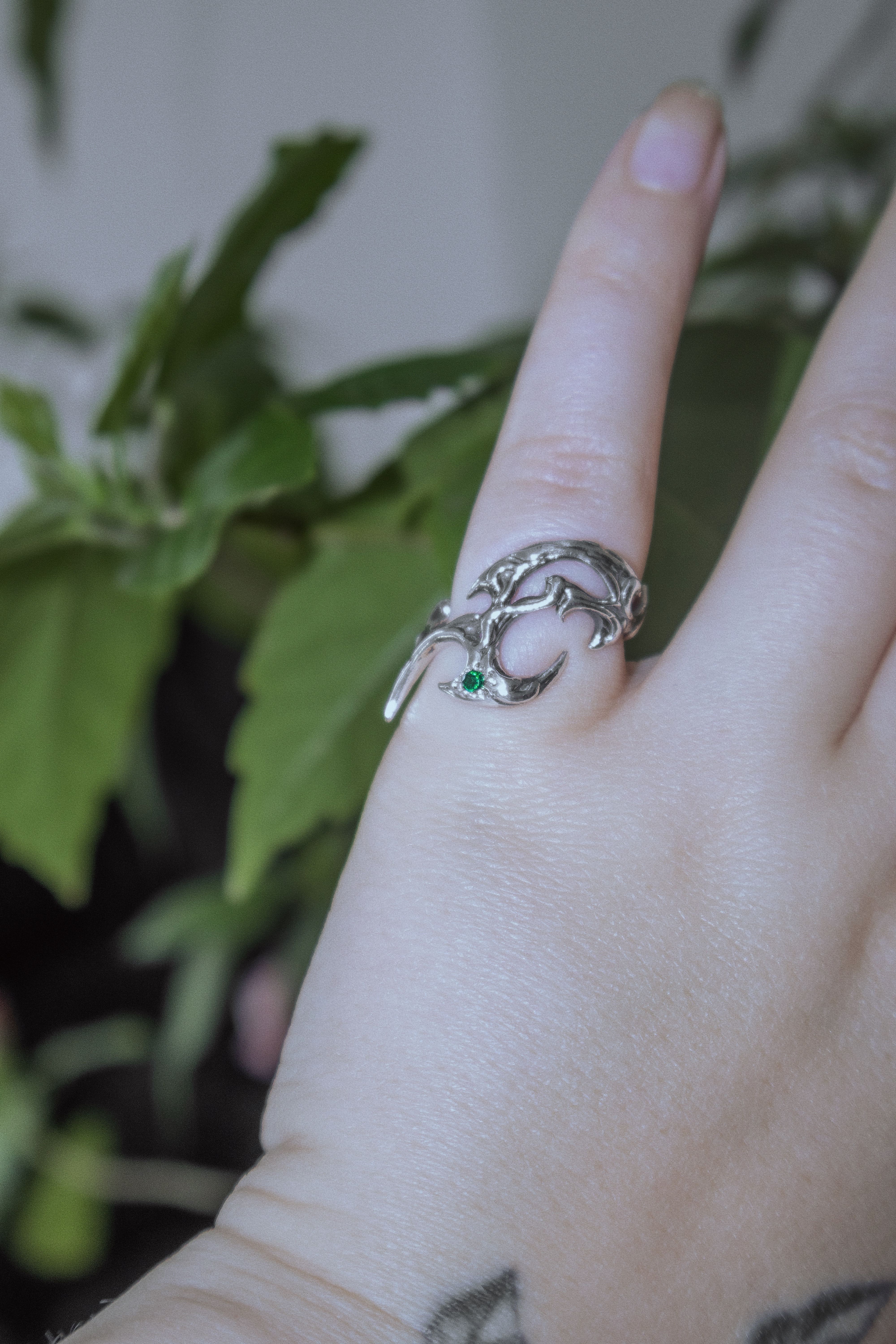 Tribal ring with green cubic zirconia