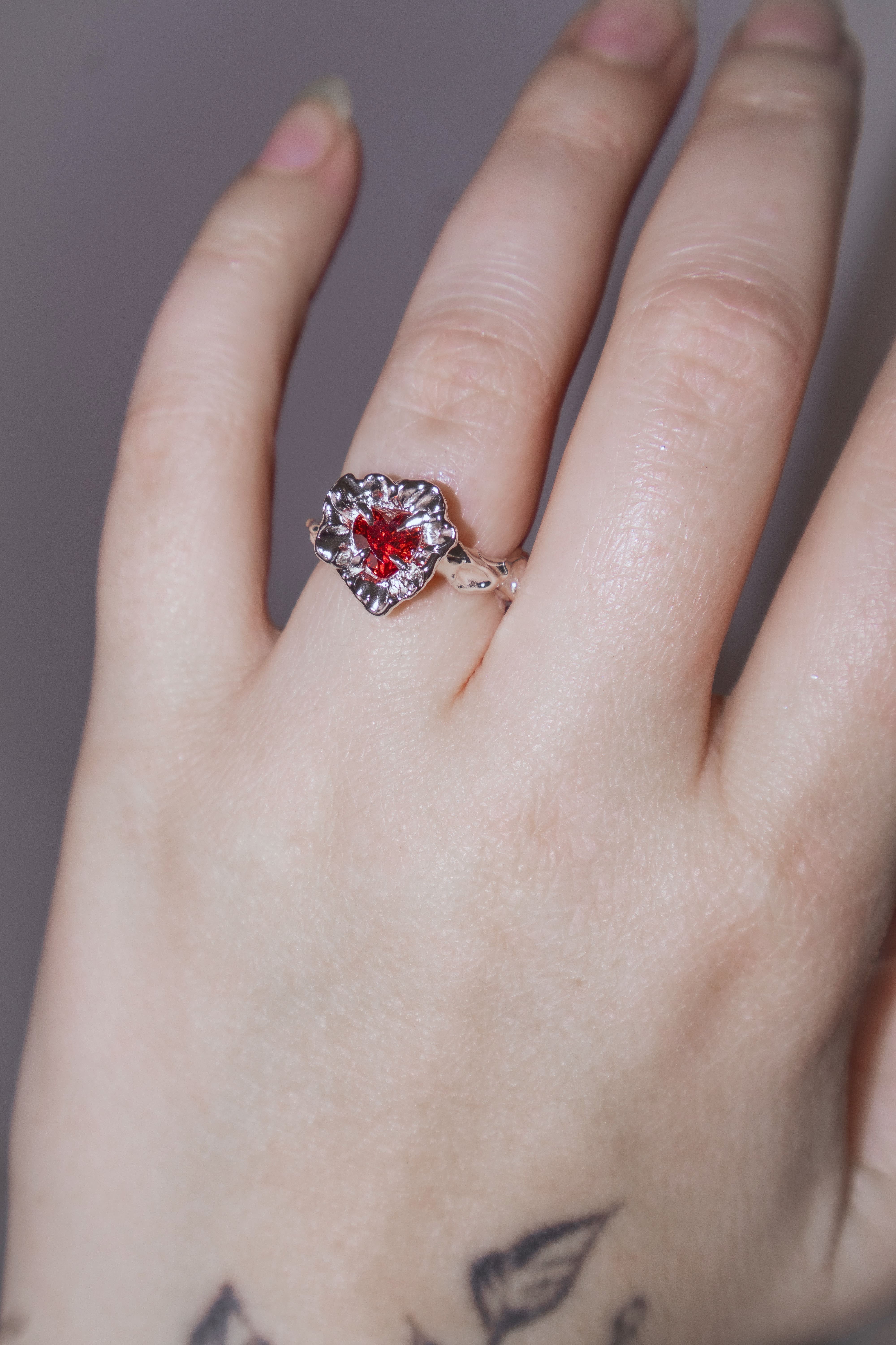 One-of-a-kind ring with a large heart-shaped stone
