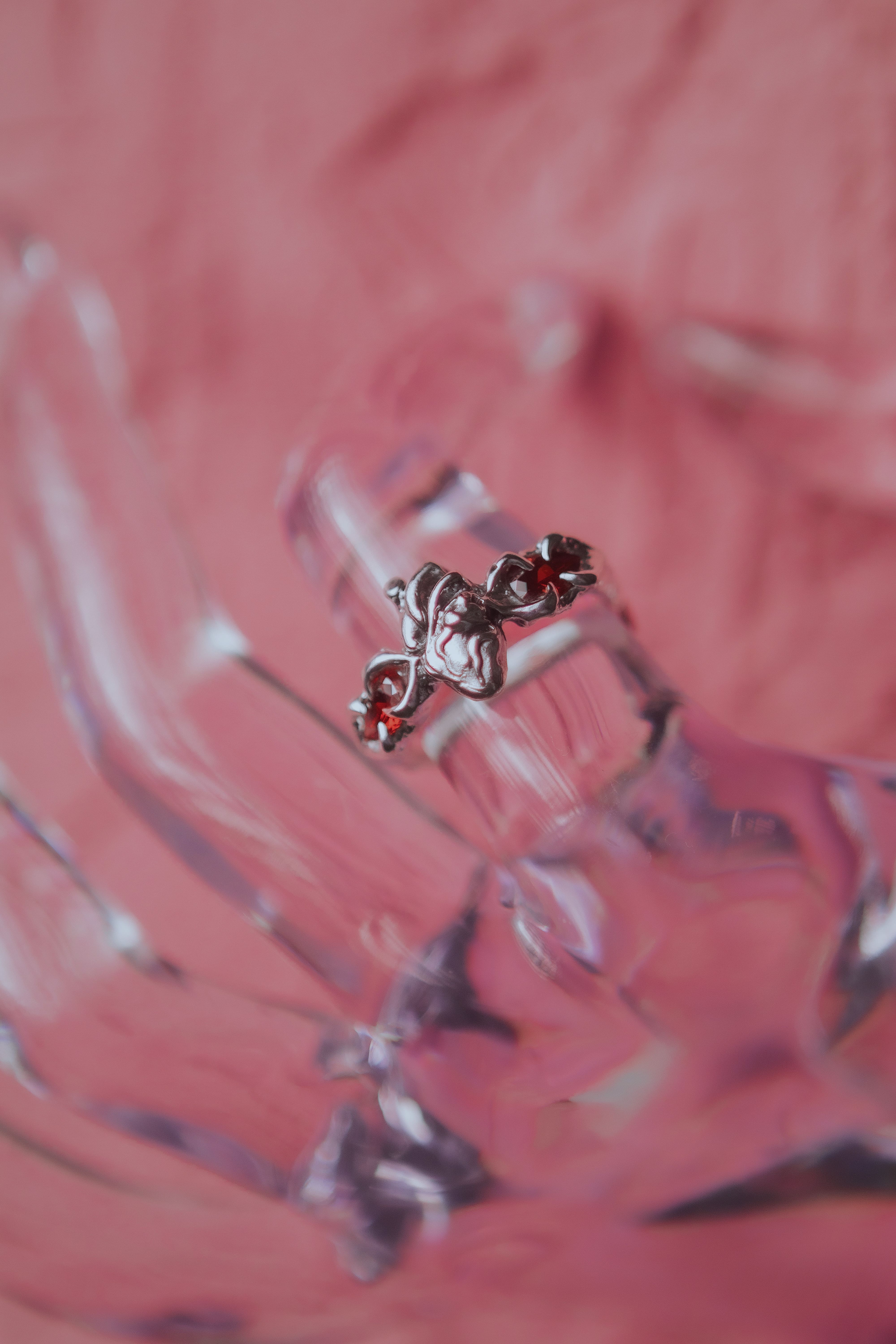 Ring with an anatomical heart and stones