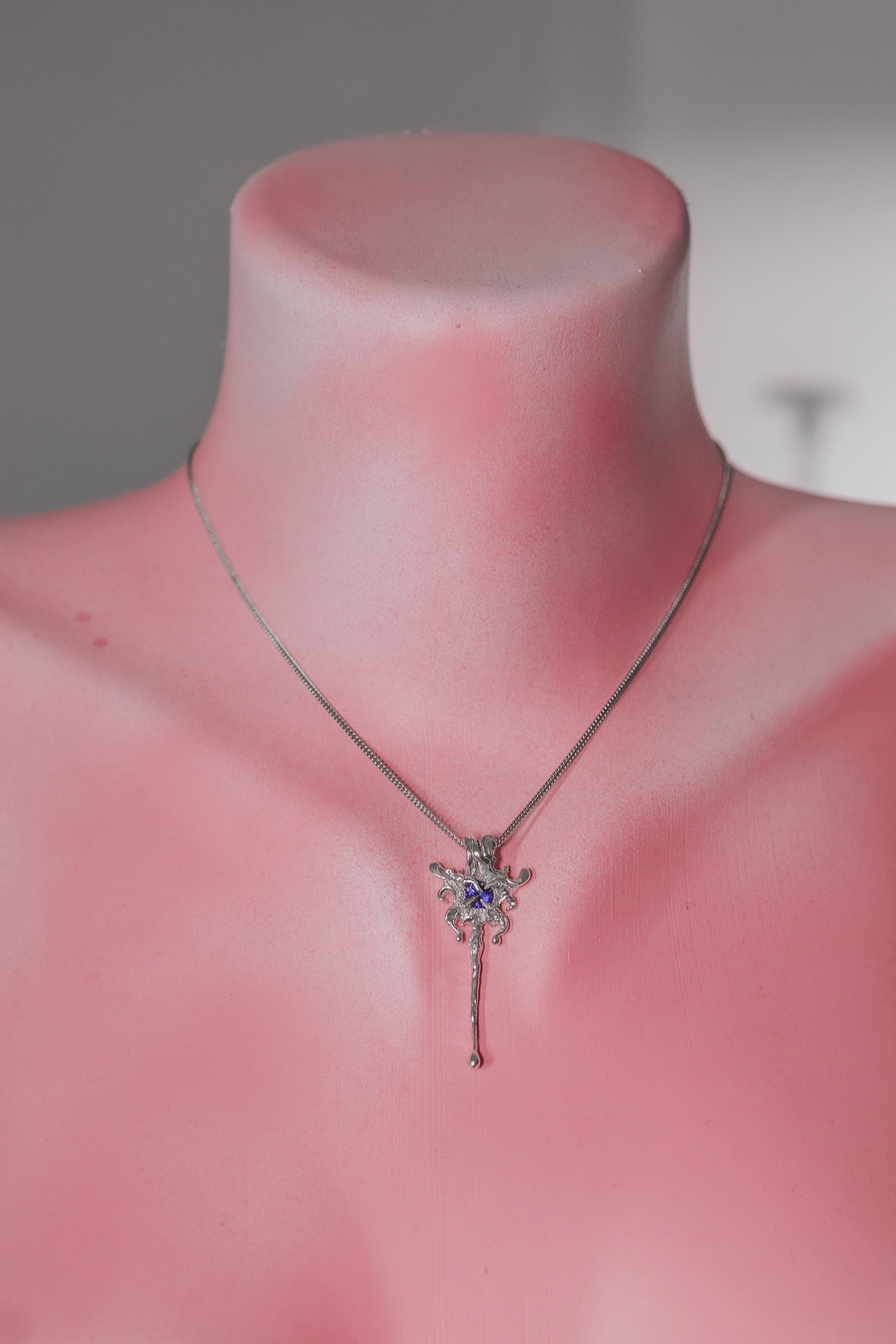 Fantasy pendant with a violet-blue stone