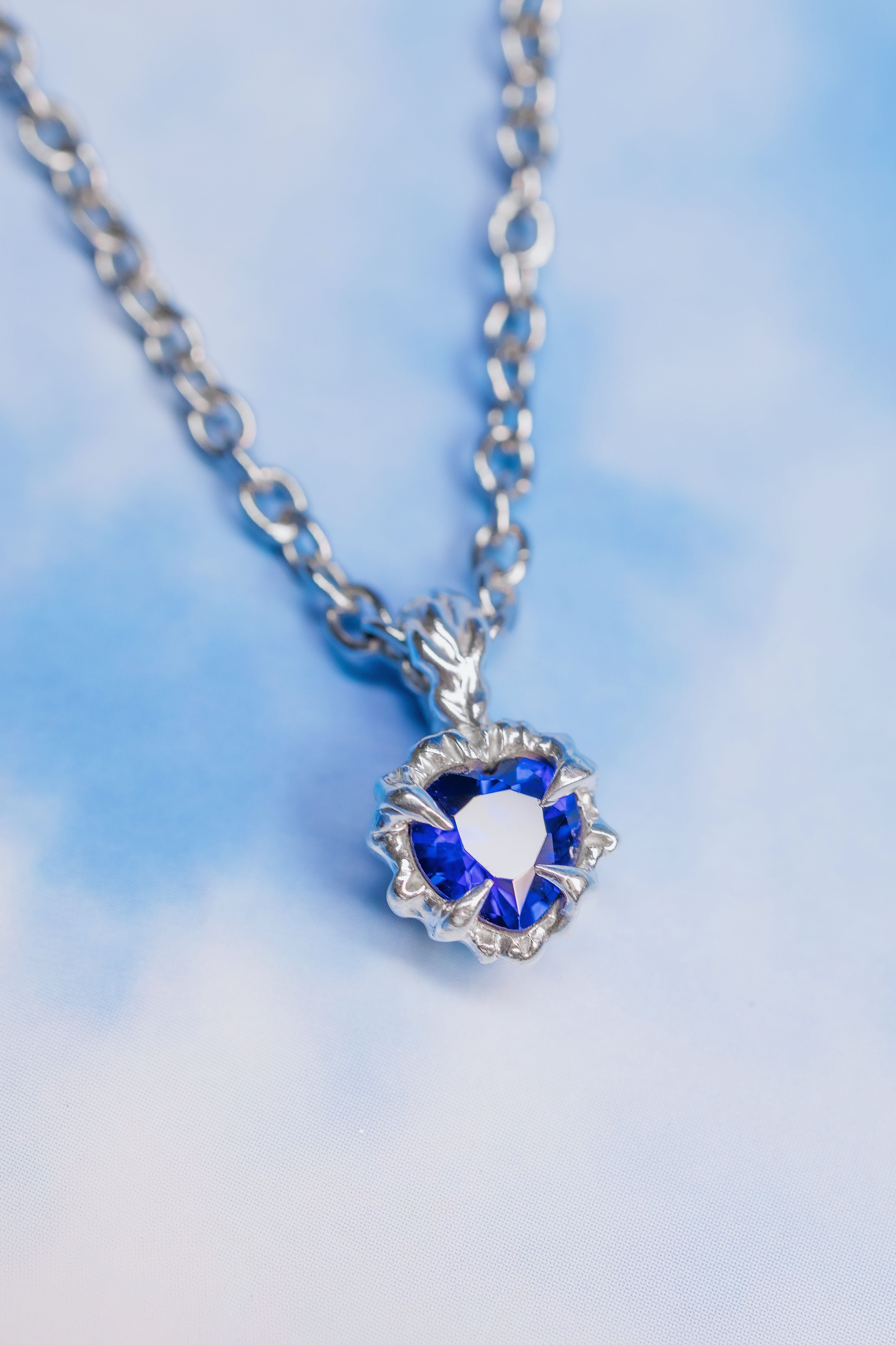 Tiny blue heart pendant