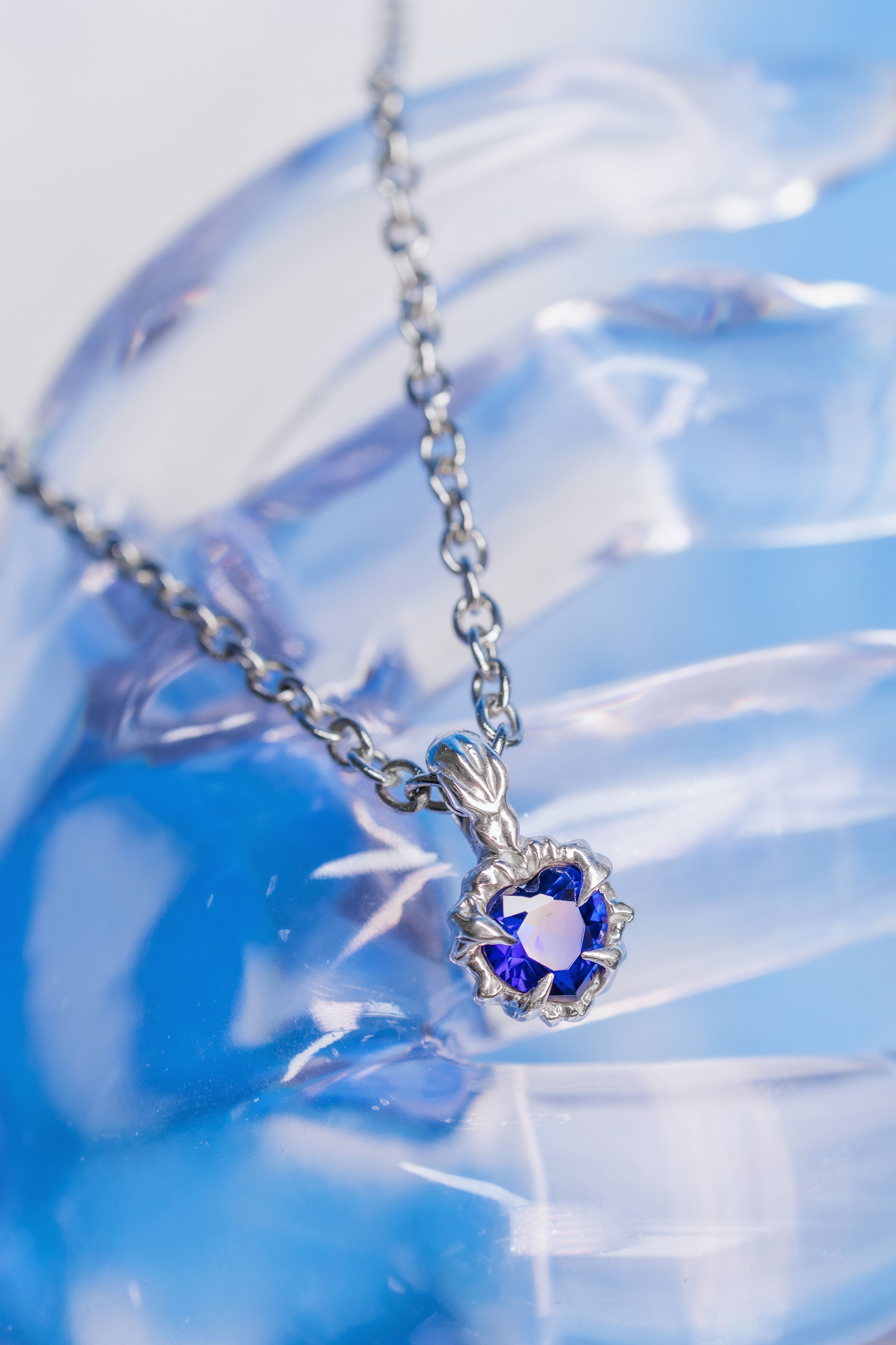 Tiny blue heart pendant