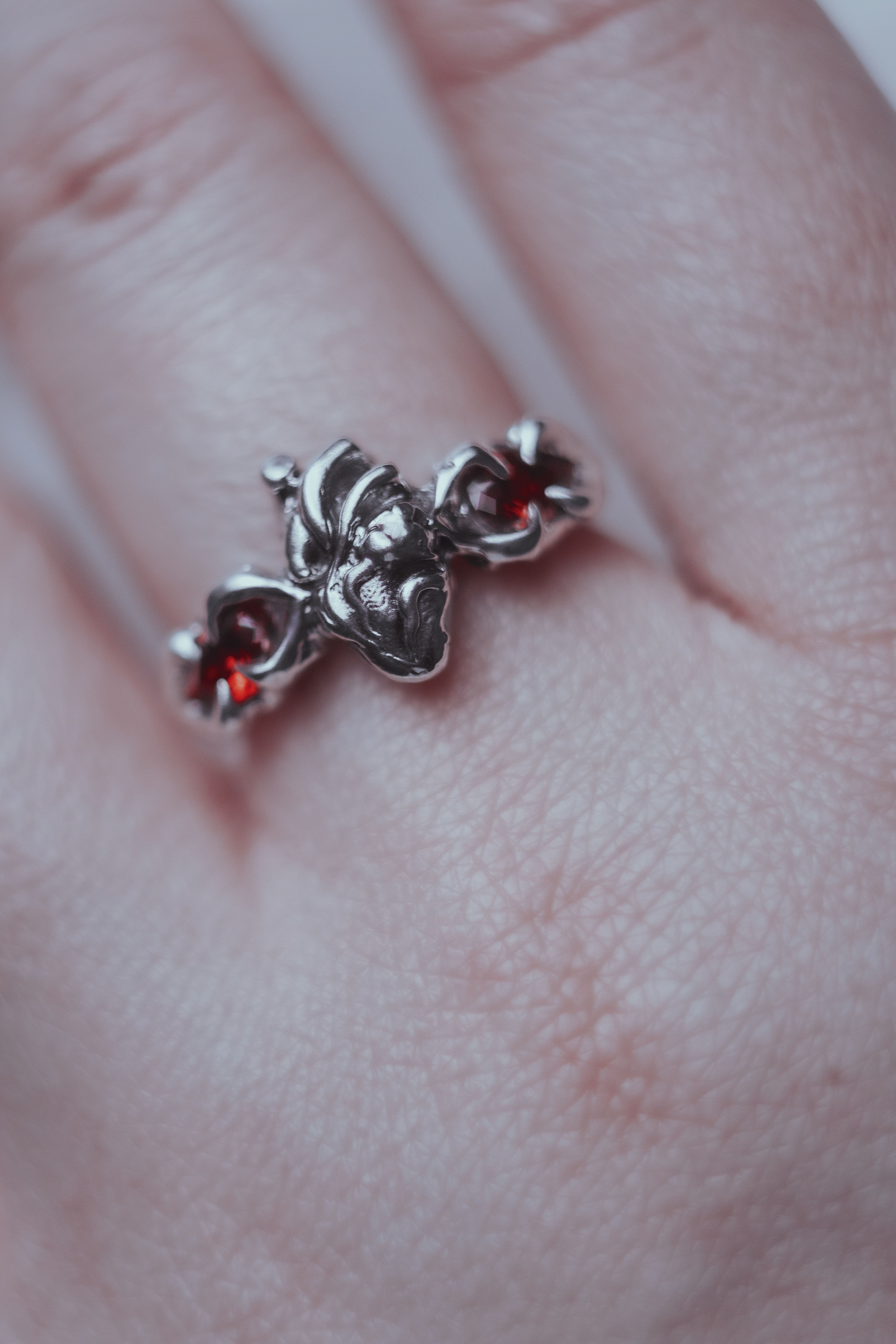 Ring with an anatomical heart and stones