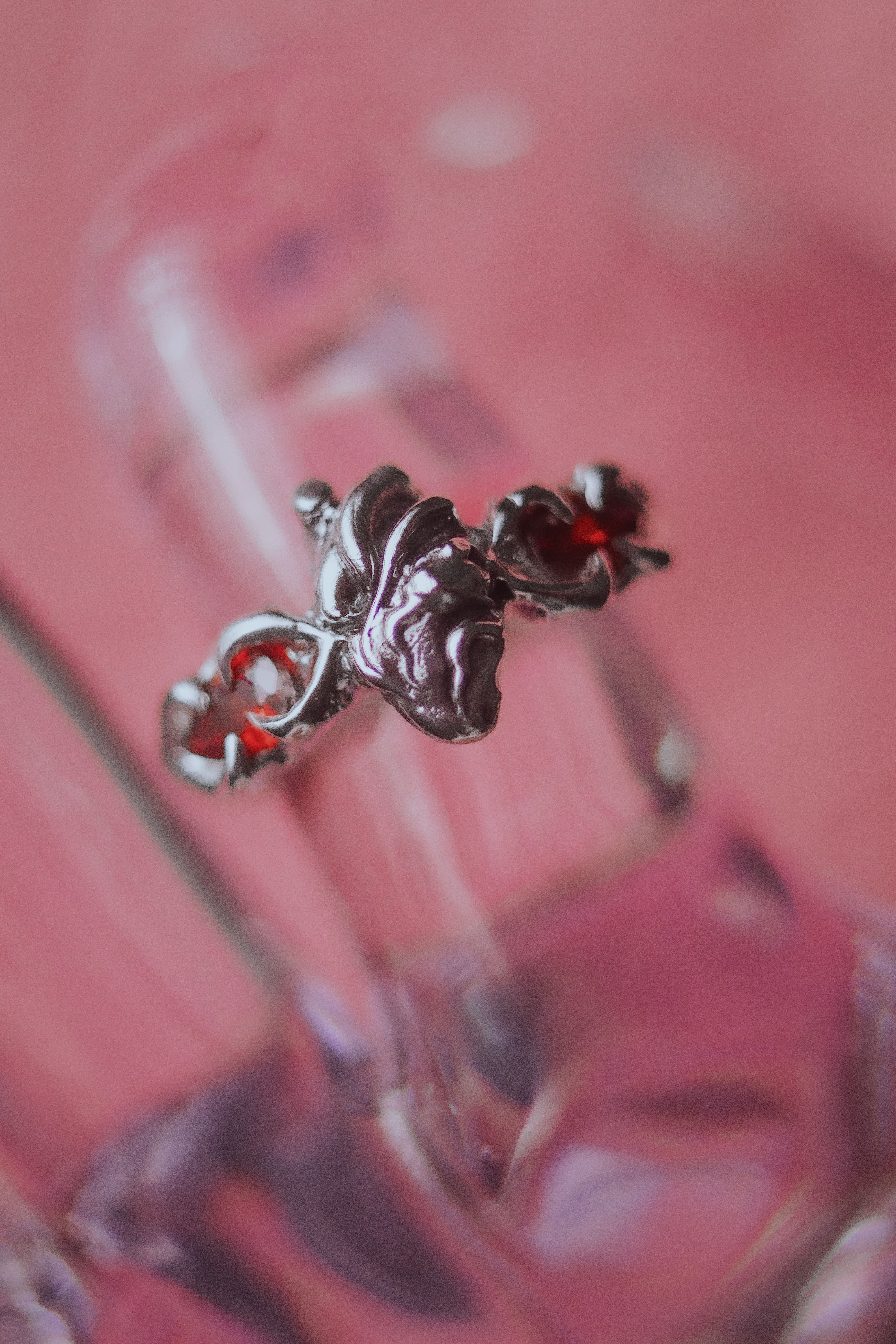 Ring with an anatomical heart and stones