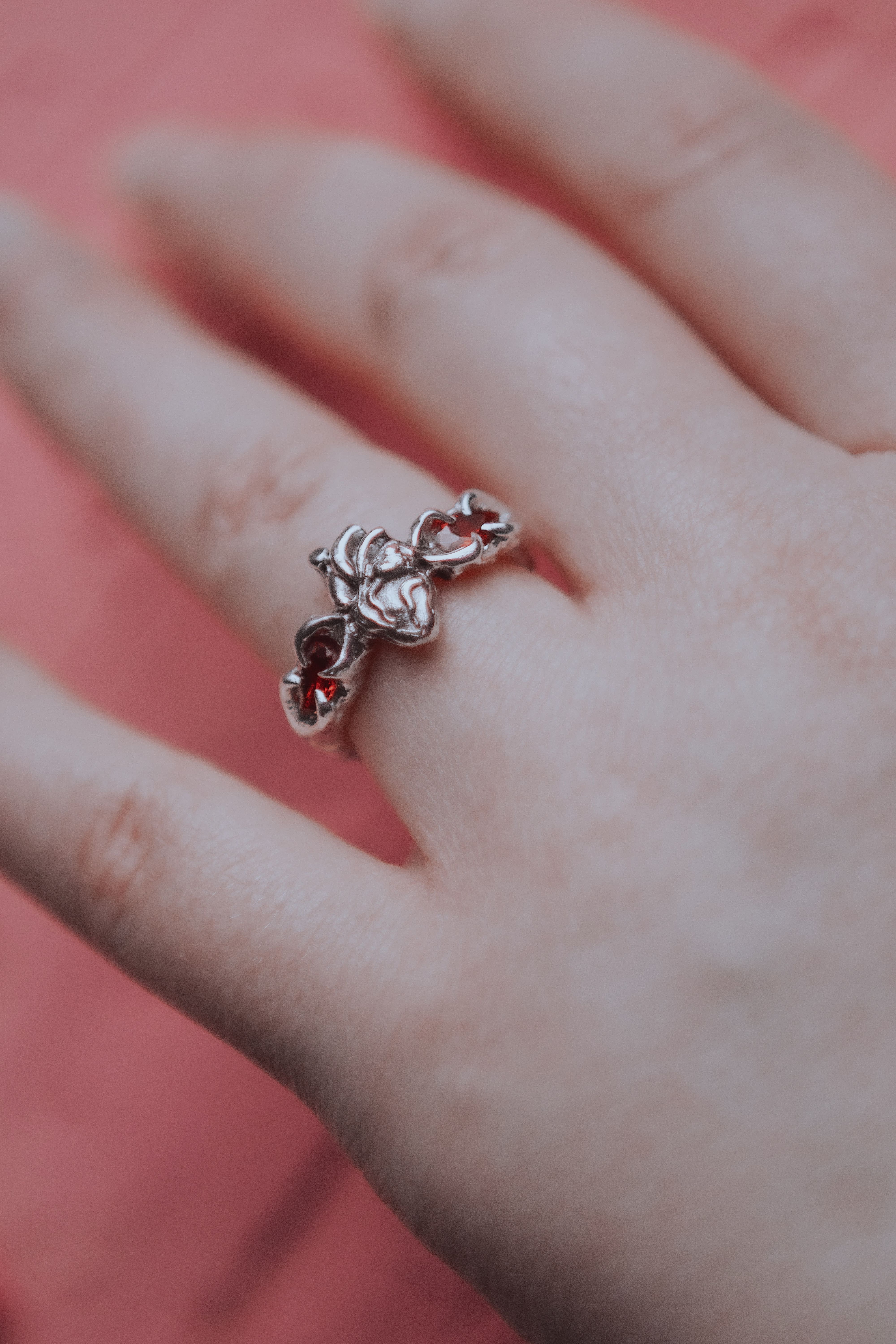 Ring with an anatomical heart and stones