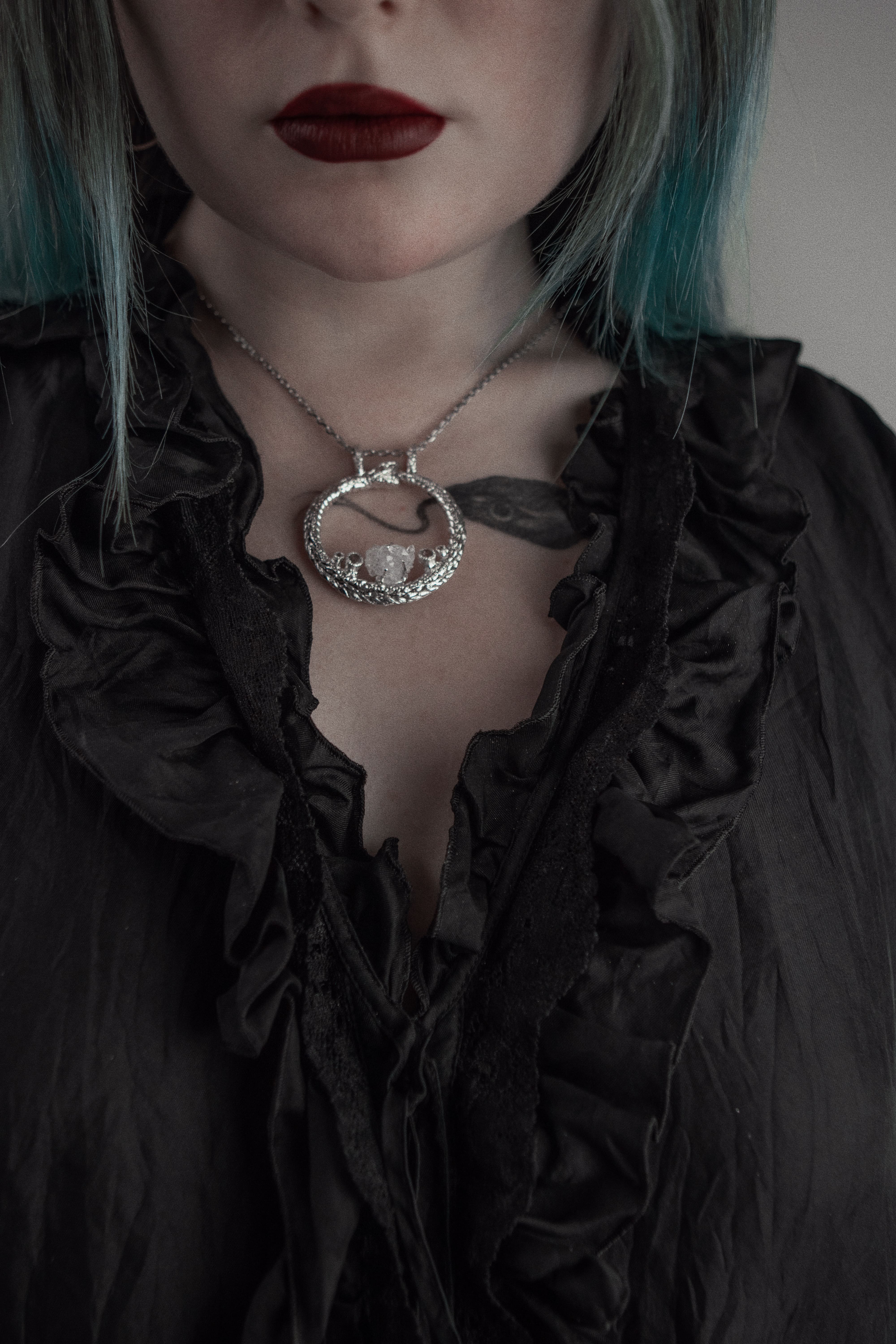 Ouroboros custom pendant with crystal and stones