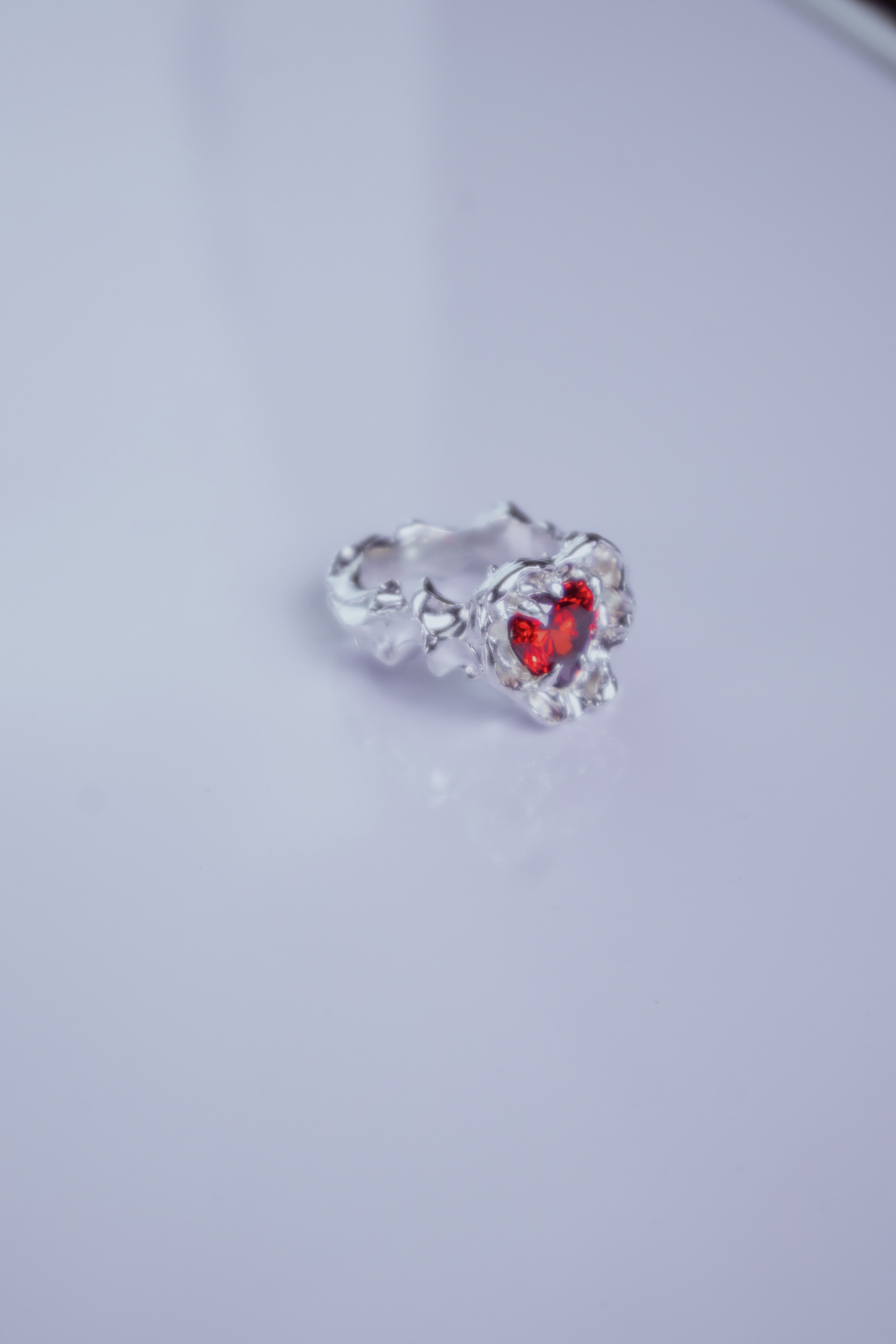 One-of-a-kind ring with a large heart-shaped stone