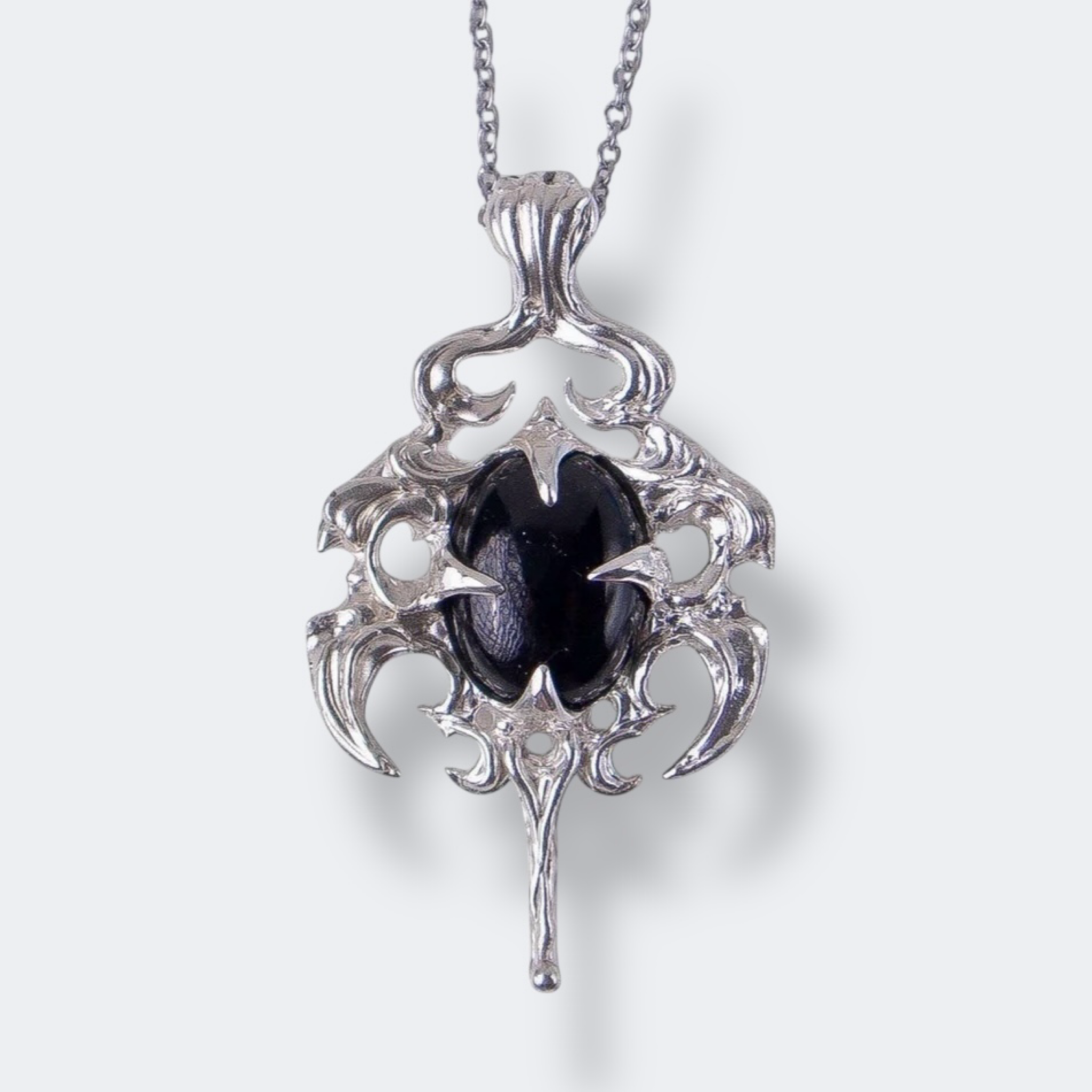 «Wing of Silence» pendant with black onyx