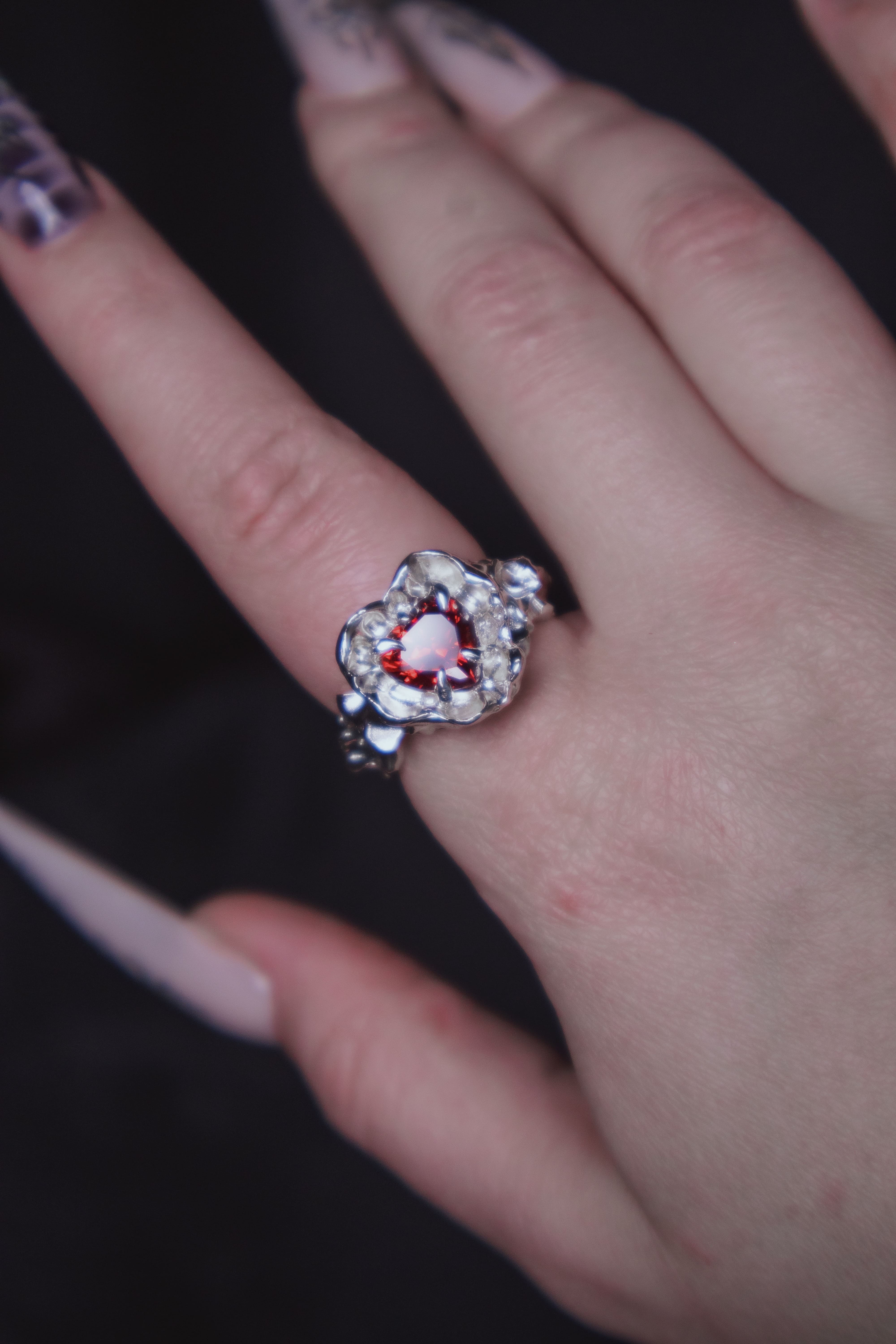 One-of-a-kind ring with a large heart-shaped stone