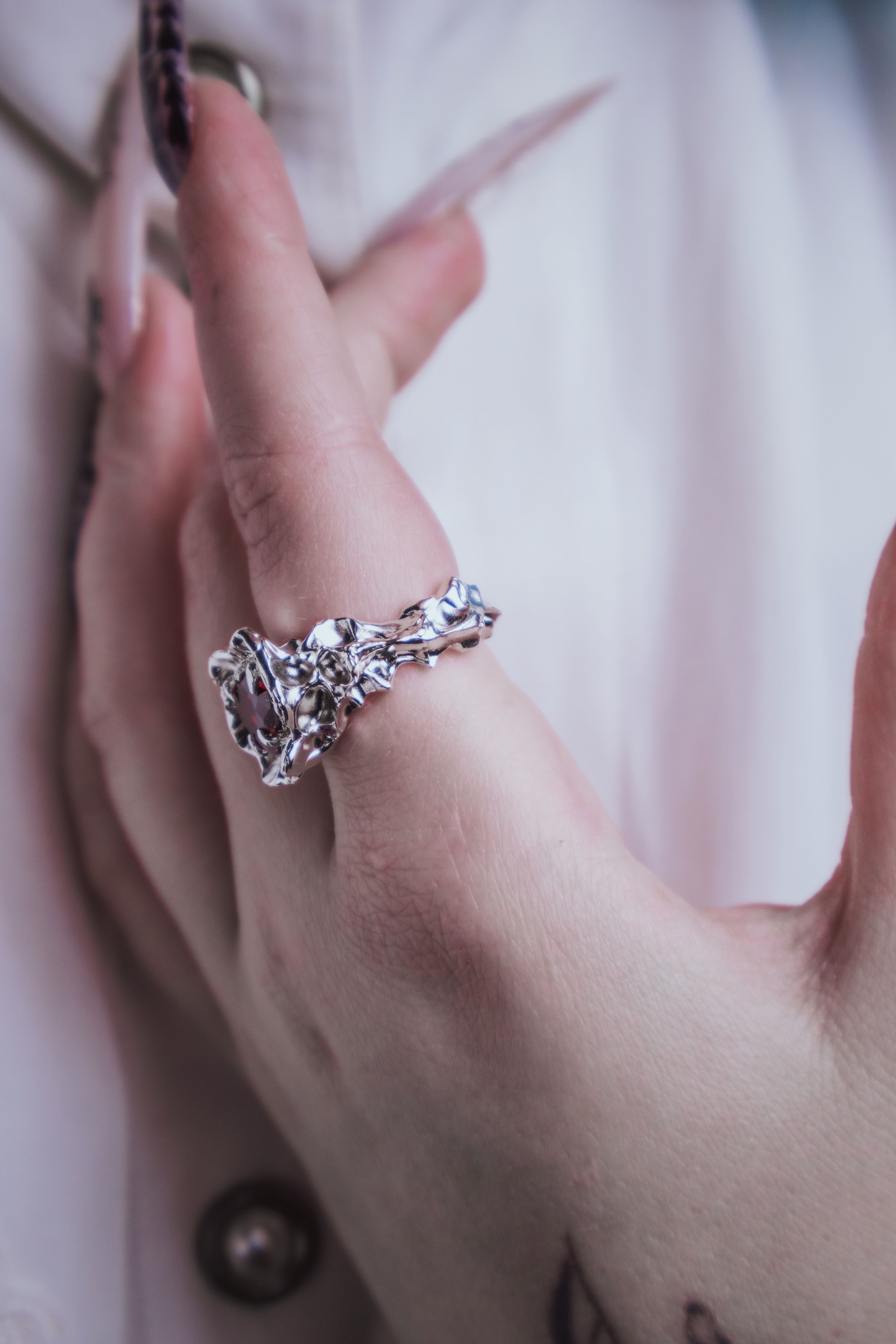 One-of-a-kind ring with a large heart-shaped stone