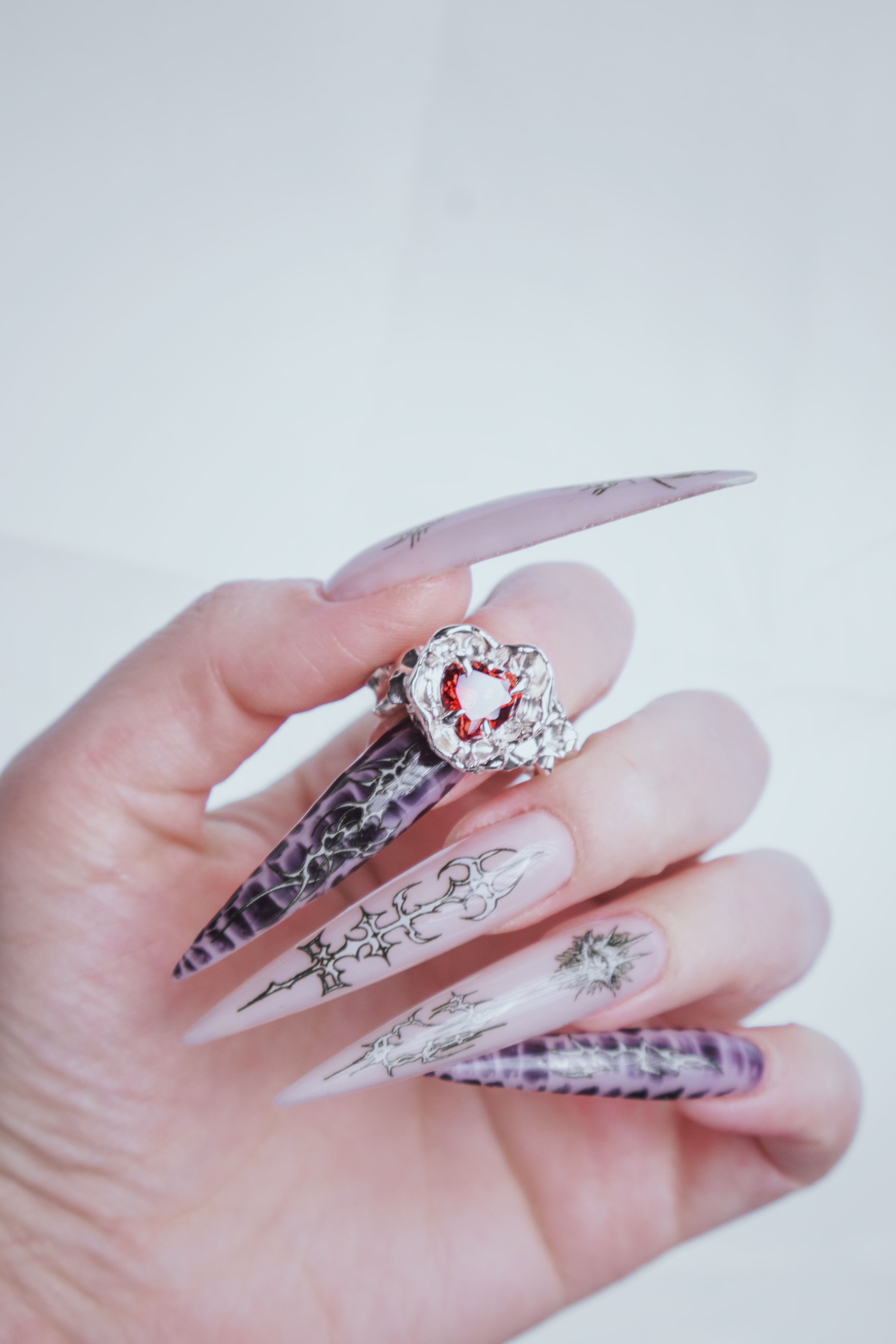 One-of-a-kind ring with a large heart-shaped stone