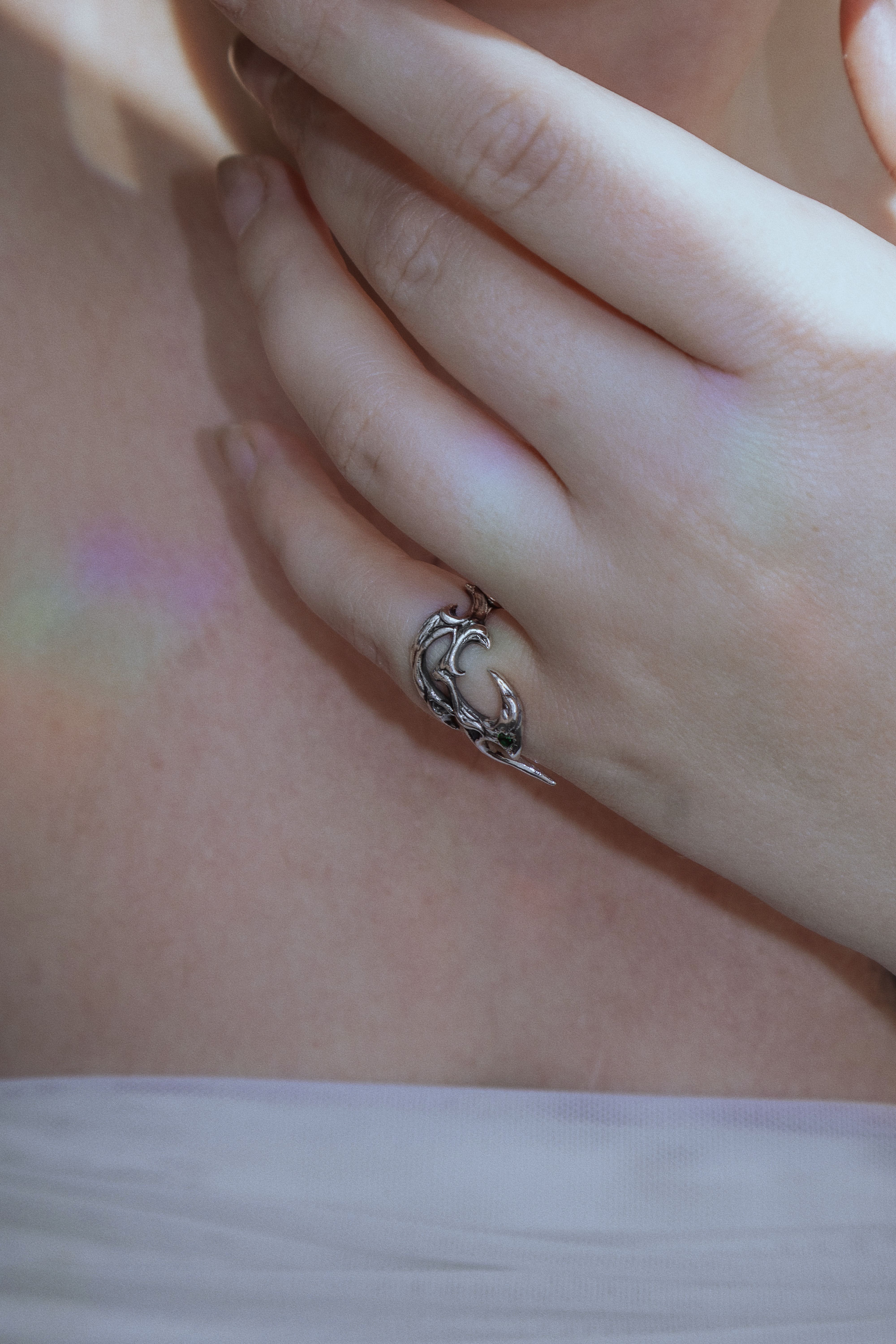 Tribal ring with green cubic zirconia