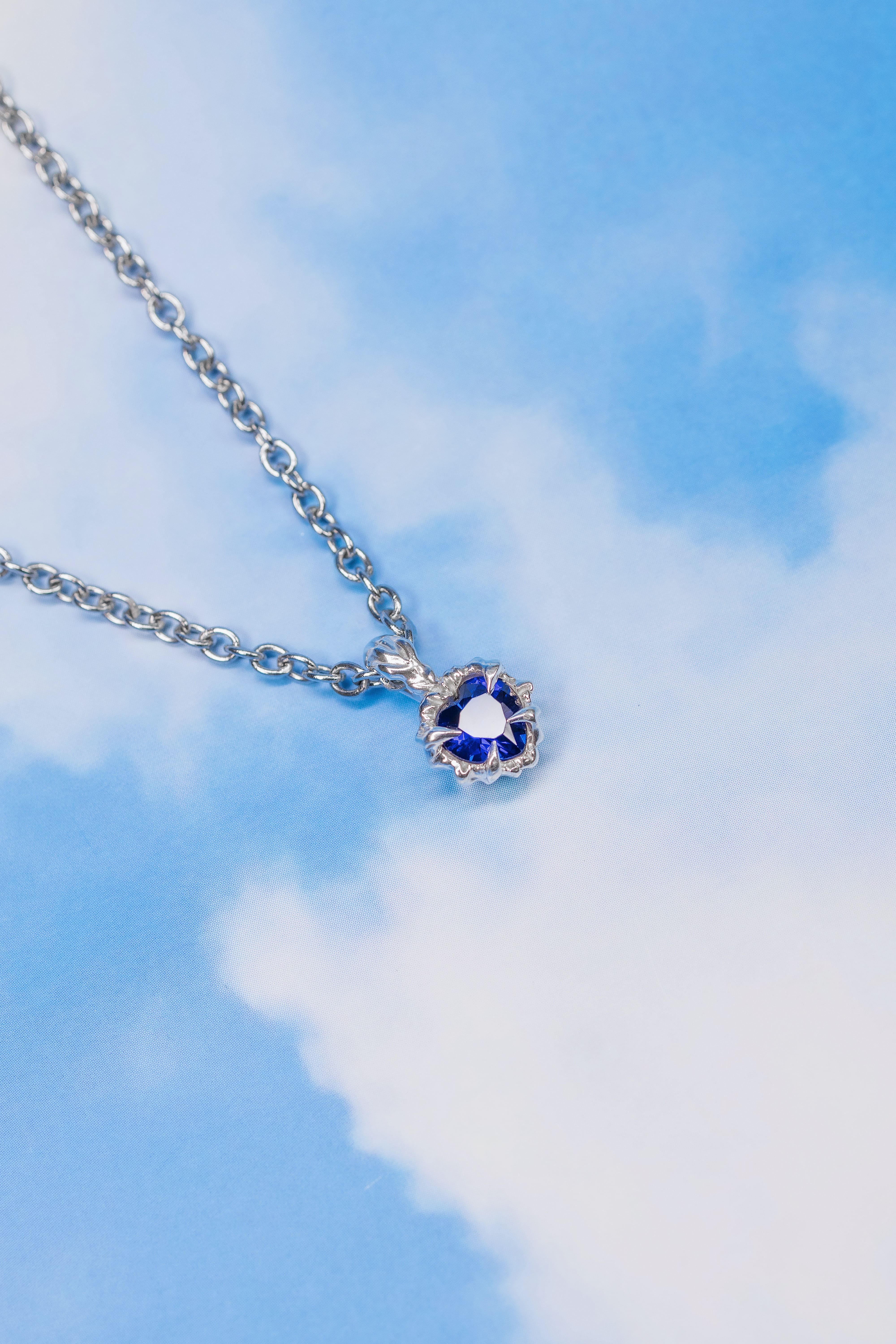 Tiny blue heart pendant