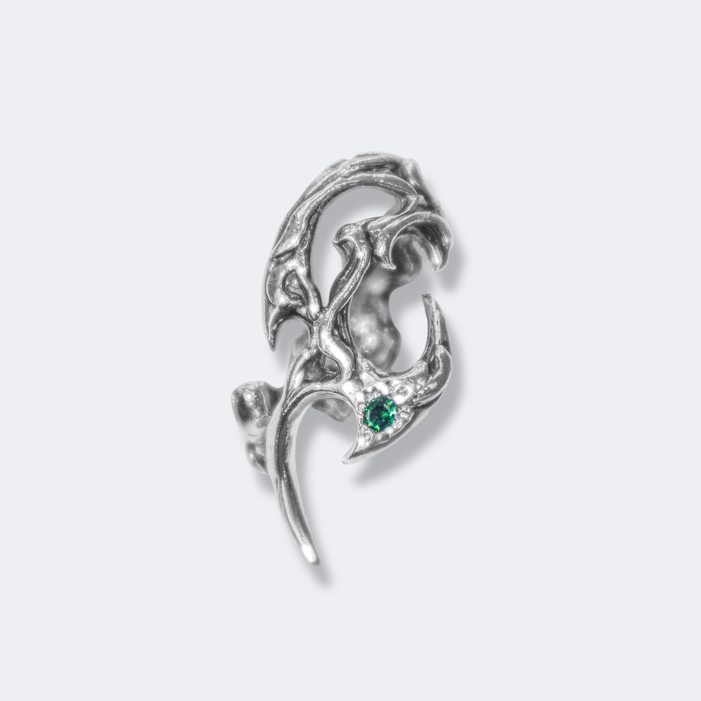 Tribal ring with green cubic zirconia