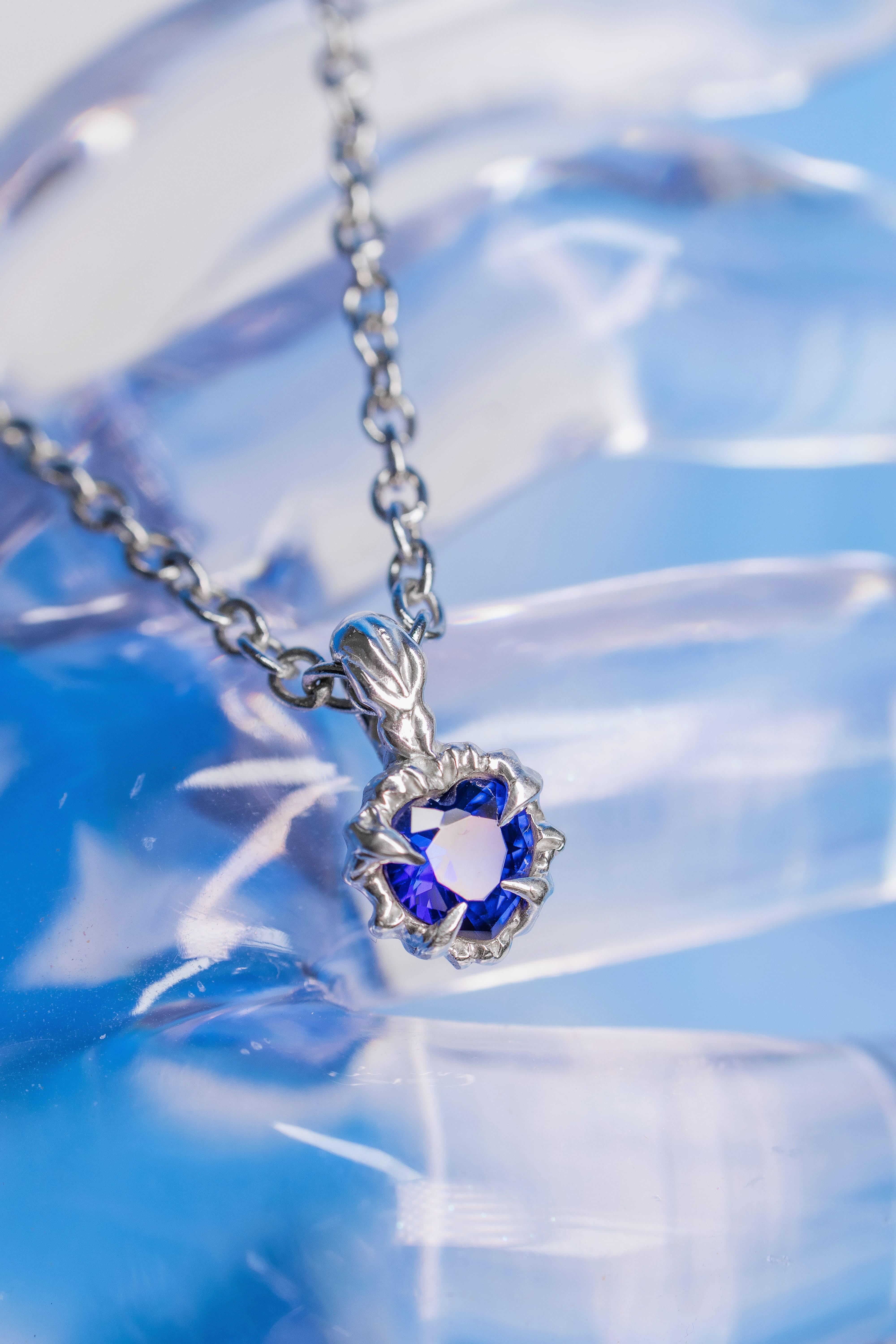 Tiny blue heart pendant