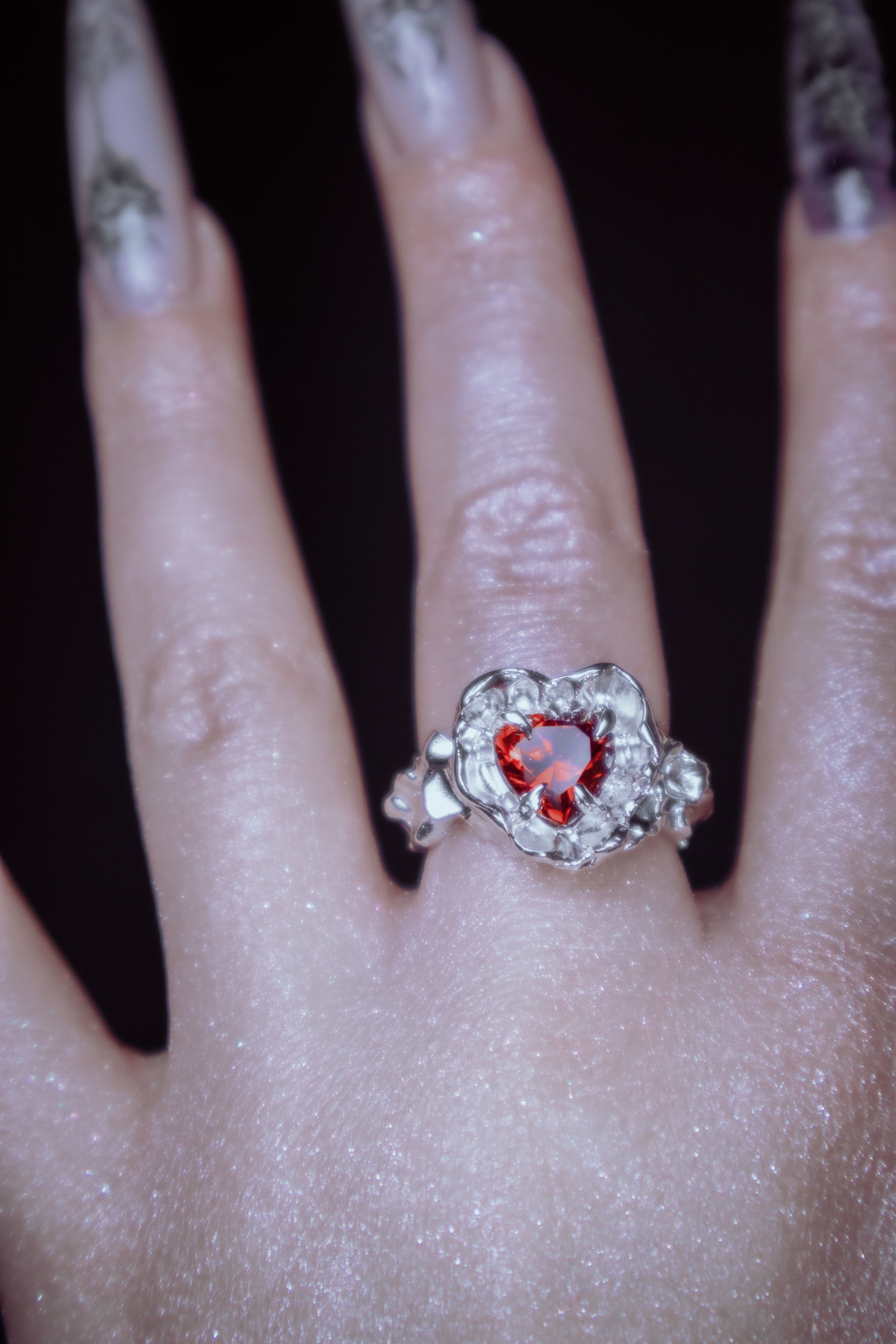 One-of-a-kind ring with a large heart-shaped stone