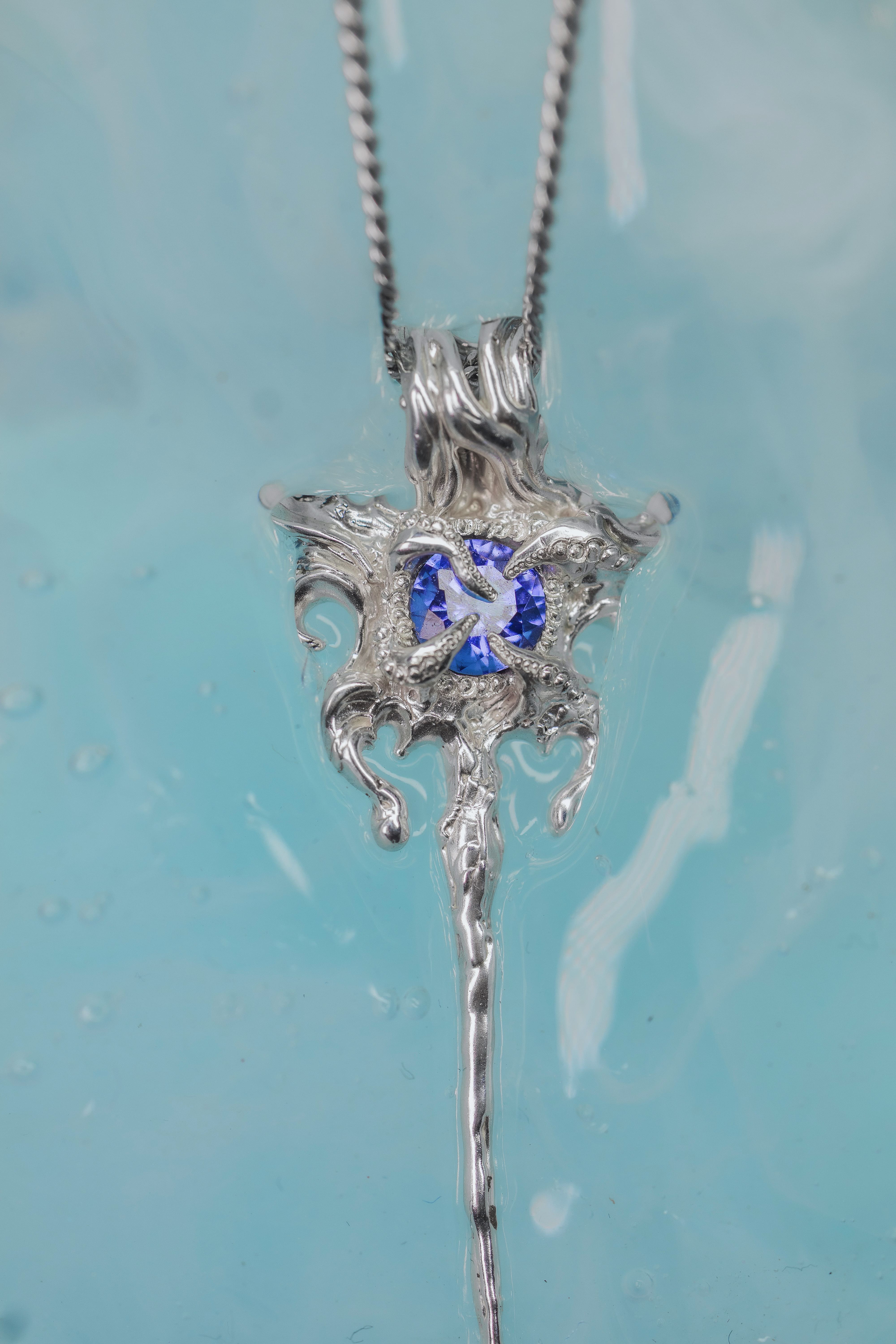 Fantasy pendant with a violet-blue stone