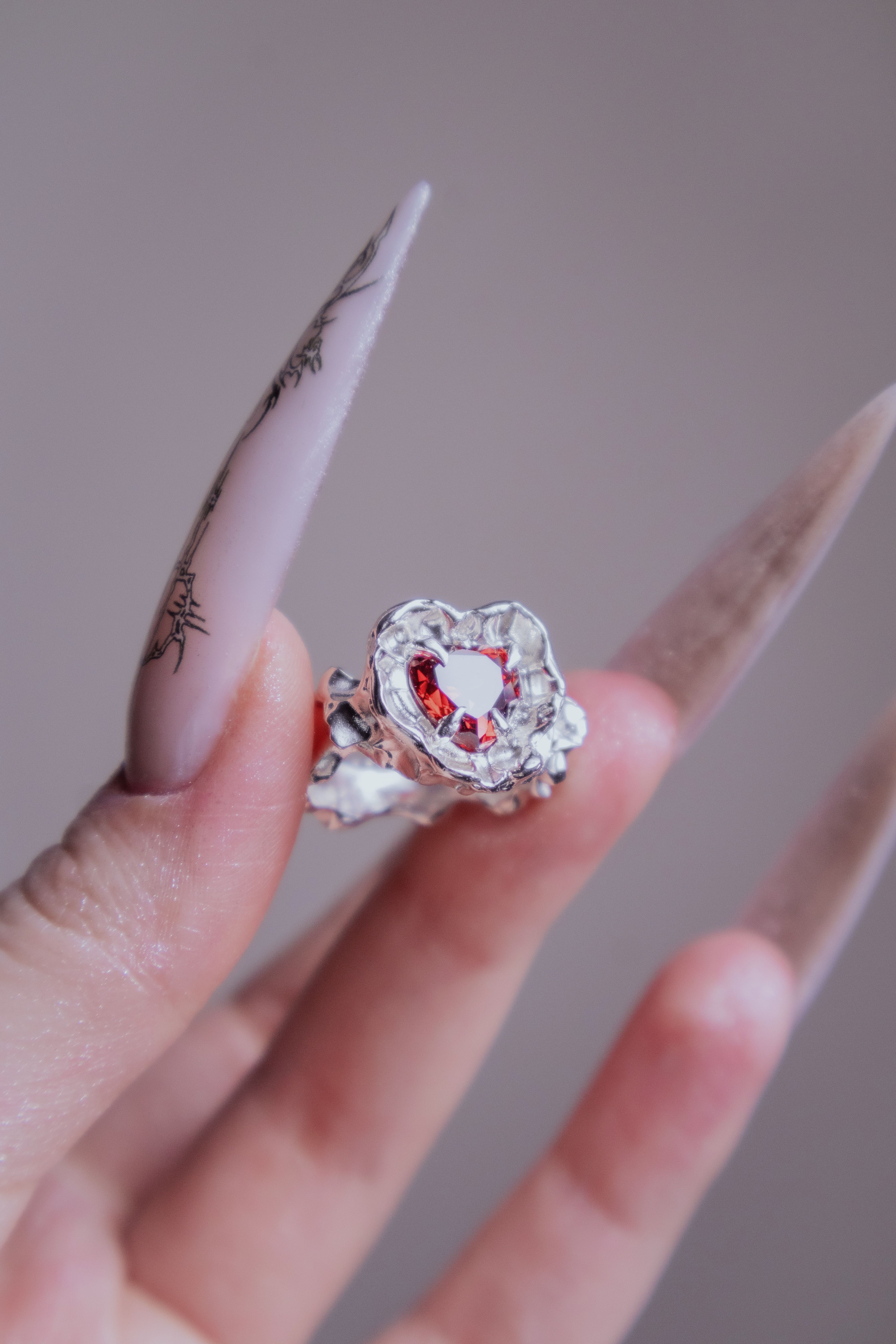 One-of-a-kind ring with a large heart-shaped stone