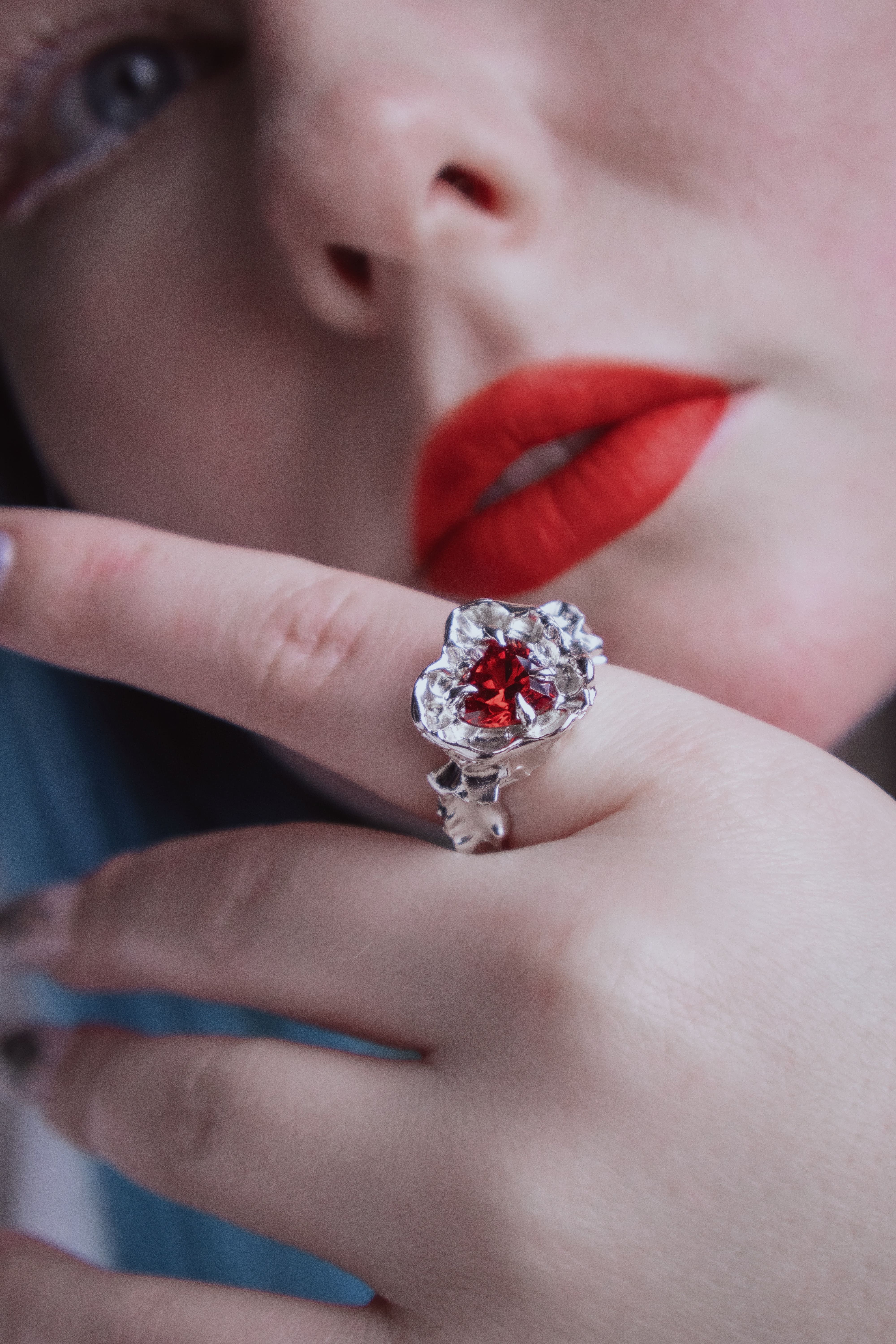 One-of-a-kind ring with a large heart-shaped stone