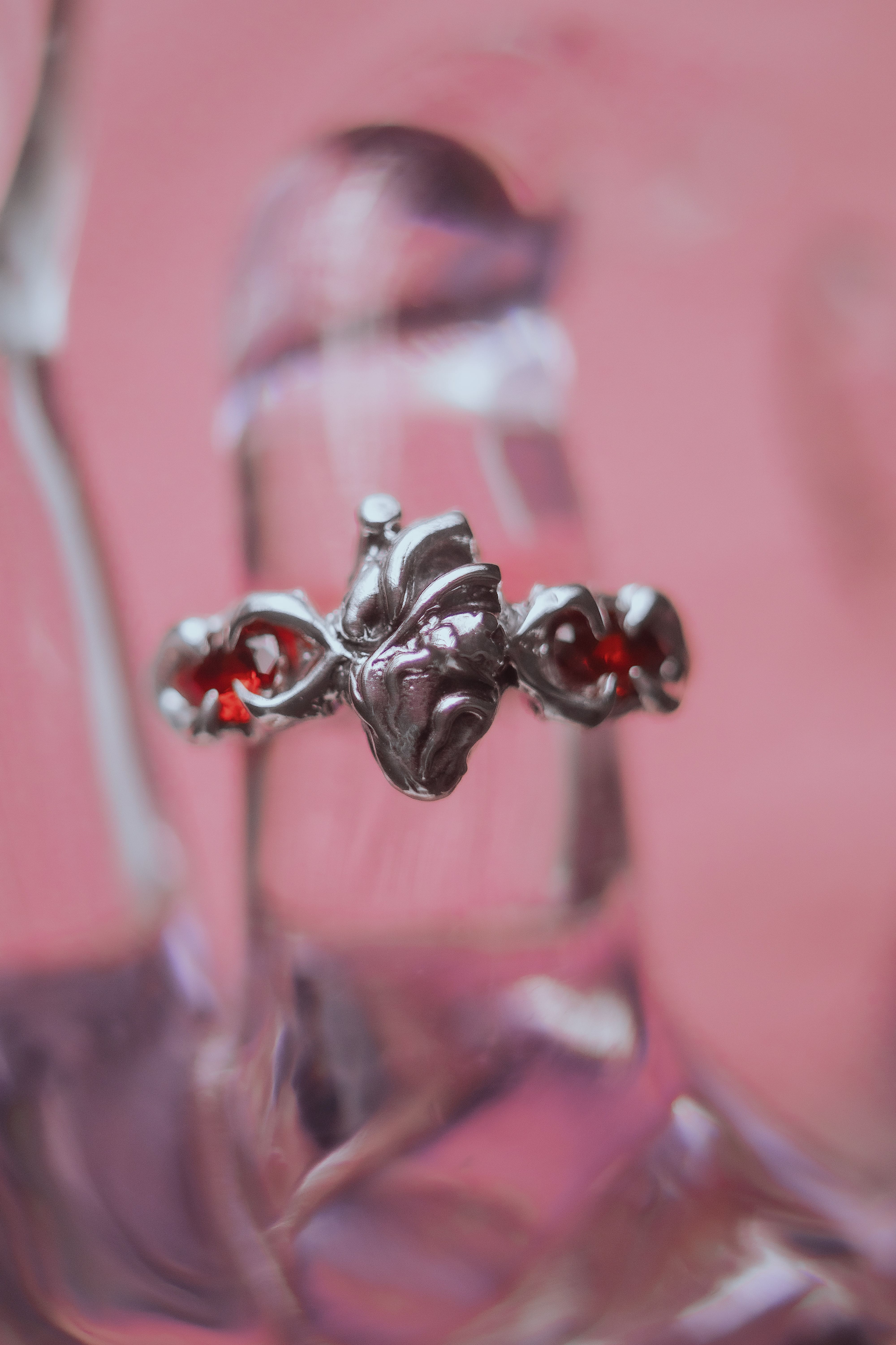 Ring with an anatomical heart and stones